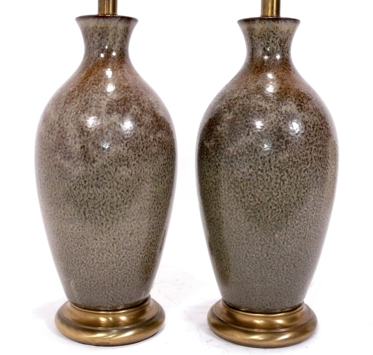 Pair of Elegant Mid Century Pottery Lamps with a Speckled Brown Glaze, American, circa 1950s. They have been rewired and are ready to use. The lamp shades are NOT included. 