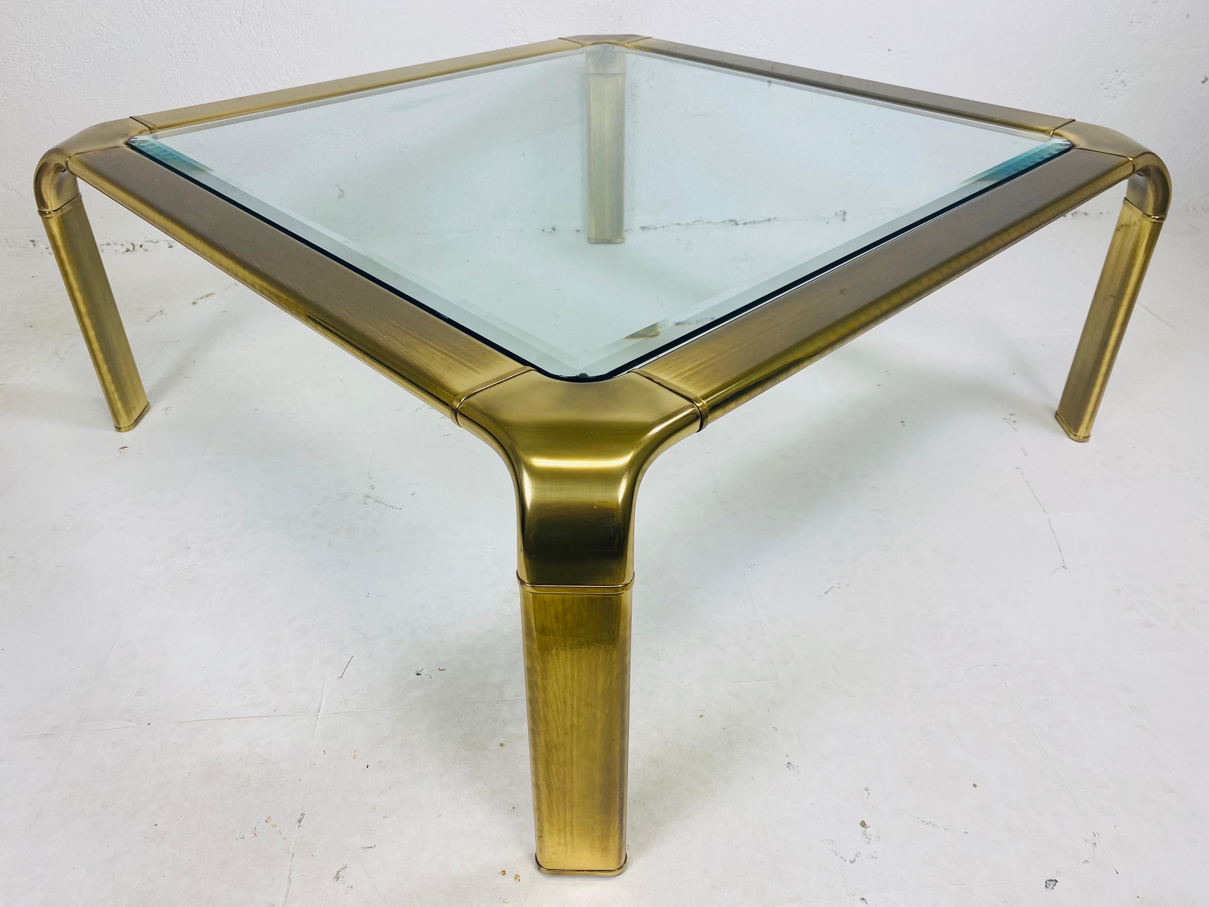 Beveled Elegant mid century solid brass cocktail table by Mastercraft For Sale