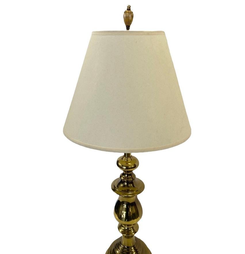 Elegant brass table lamp with recent shade, includes harp, finial, and accommodates modern bulbs. Tested and working with original wiring. In good condition with minimal wear.