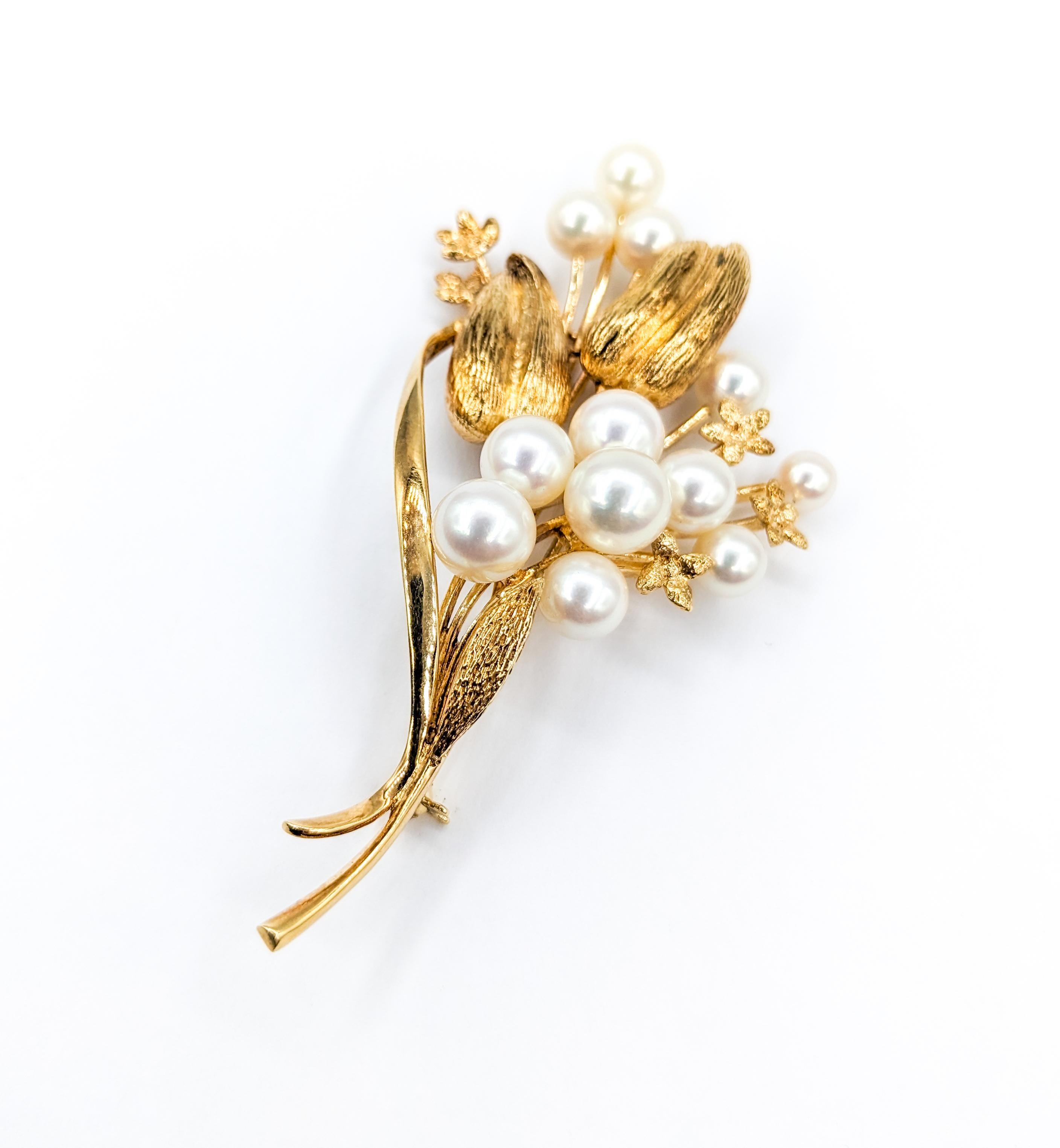 Round Cut Elegant Mikimoto Brooch Adorned with Akoya Pearls For Sale