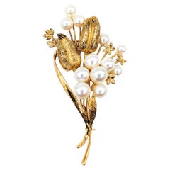 Elegant Mikimoto Brooch Adorned with Akoya Pearls