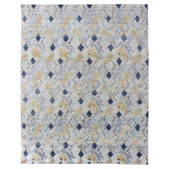 Elegant Modern Geometric Rug in Soft Blues and Warm Gold Tones