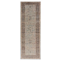 Elegante runner moderno in stile ottomano con motivi intricati in blu e marrone