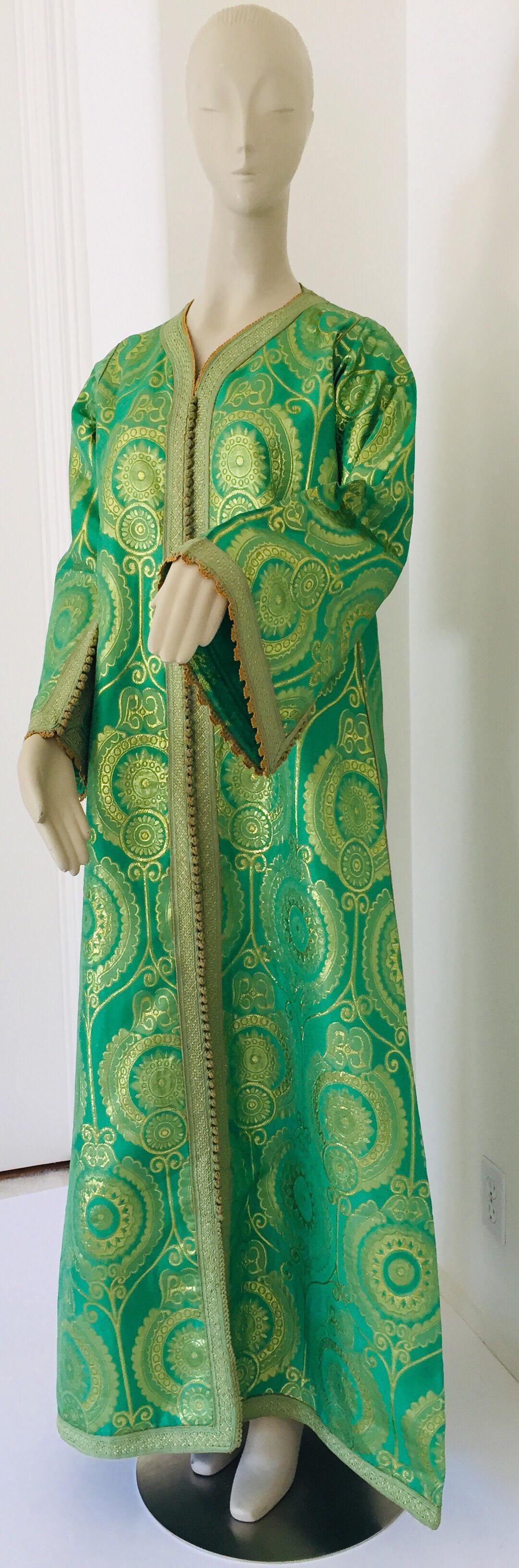 Elegant Moroccan caftan lime green and gold lame metallic floral brocade,
This is an exceptional example of Moroccan fashion design dating to the 1970s, 
Handcrafted in Morocco and tailored for a relaxed fit with wide sleeves, It is made in the