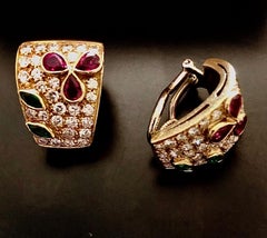 Elegant multi gem ear clips, w/ sparkling white diamonds, emeralds and rubies