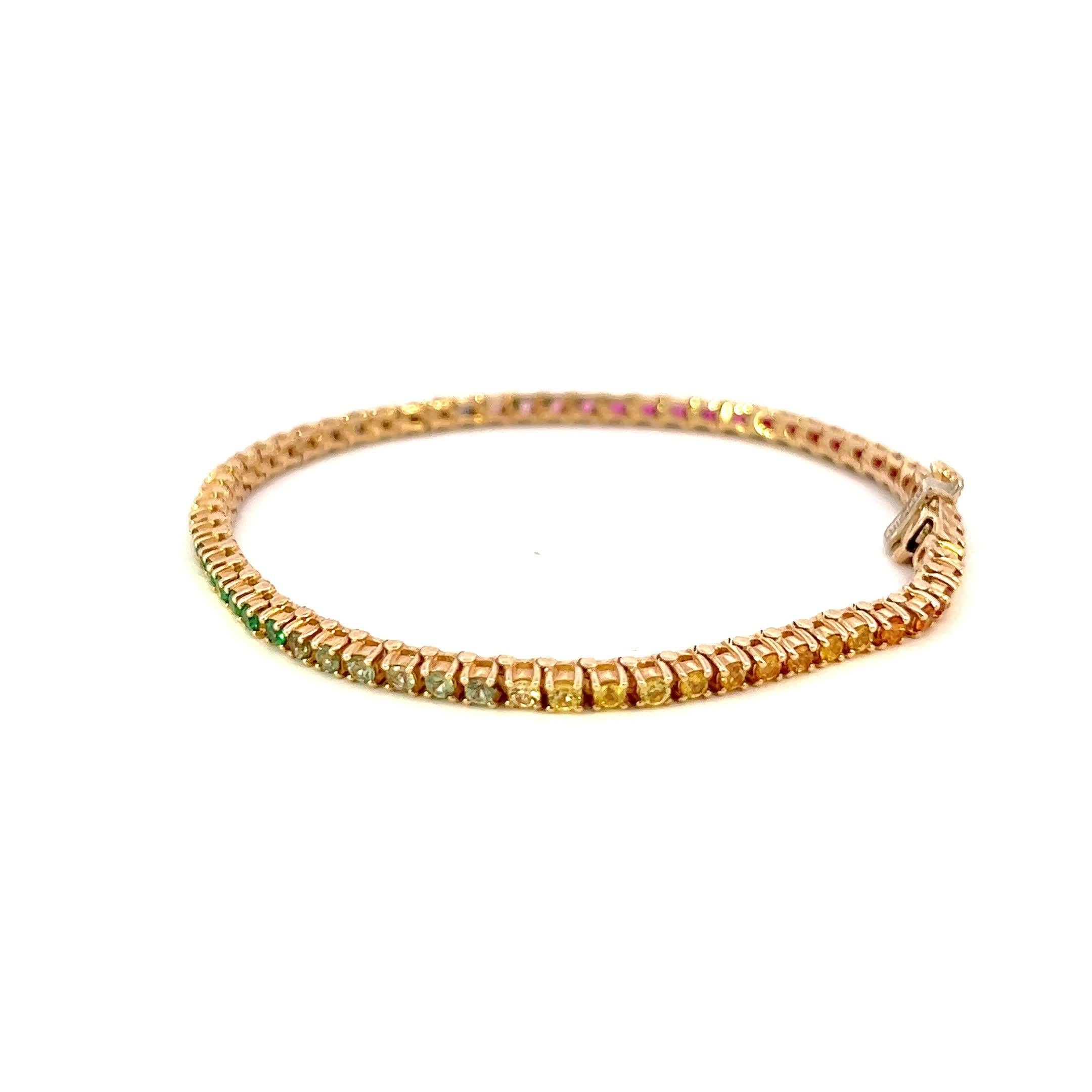 This stunning multicolored bracelet features a delicate design that beautifully combines vibrant gemstones with a sleek gold band. Perfect for adding a touch of elegance to any outfit, it’s an ideal accessory for both casual and formal occasions.