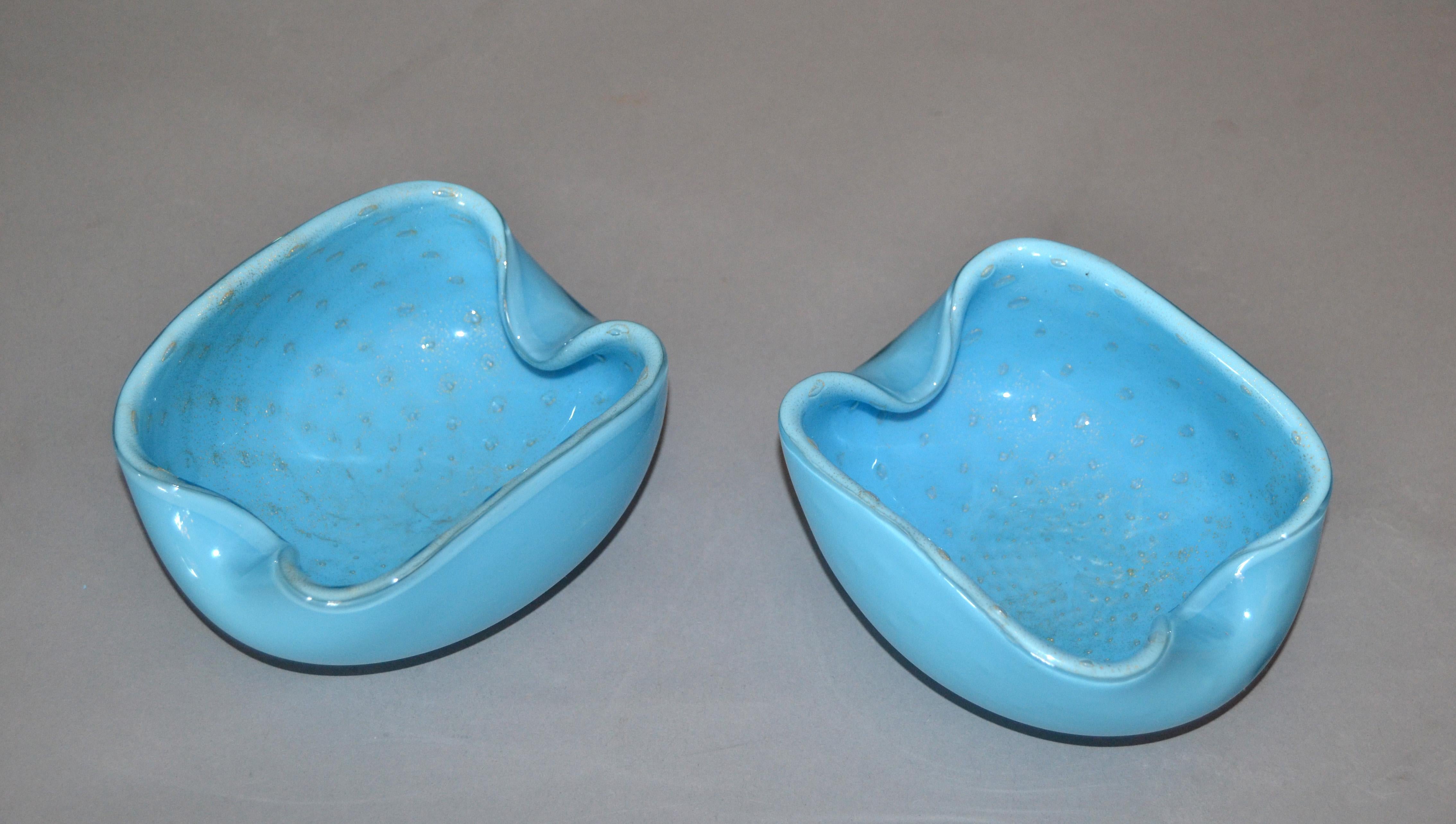 Two elegant Murano glass light blue and gold flecks bowls or catchalls.
No markings.
Simply beautiful.