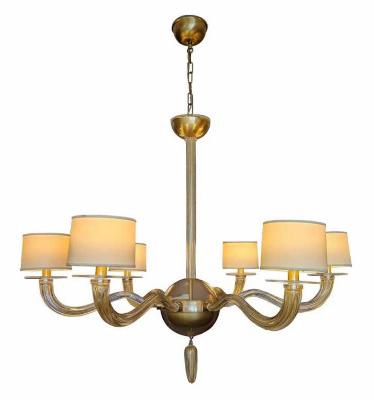 Elegant hand blown murano glass chandelier, designed by Barbara Barry for Baker, made in Italy, circa 2010. The original retail price was $16,000 from Baker. This example has never been used. It has all of the mounting hardware and is ready to