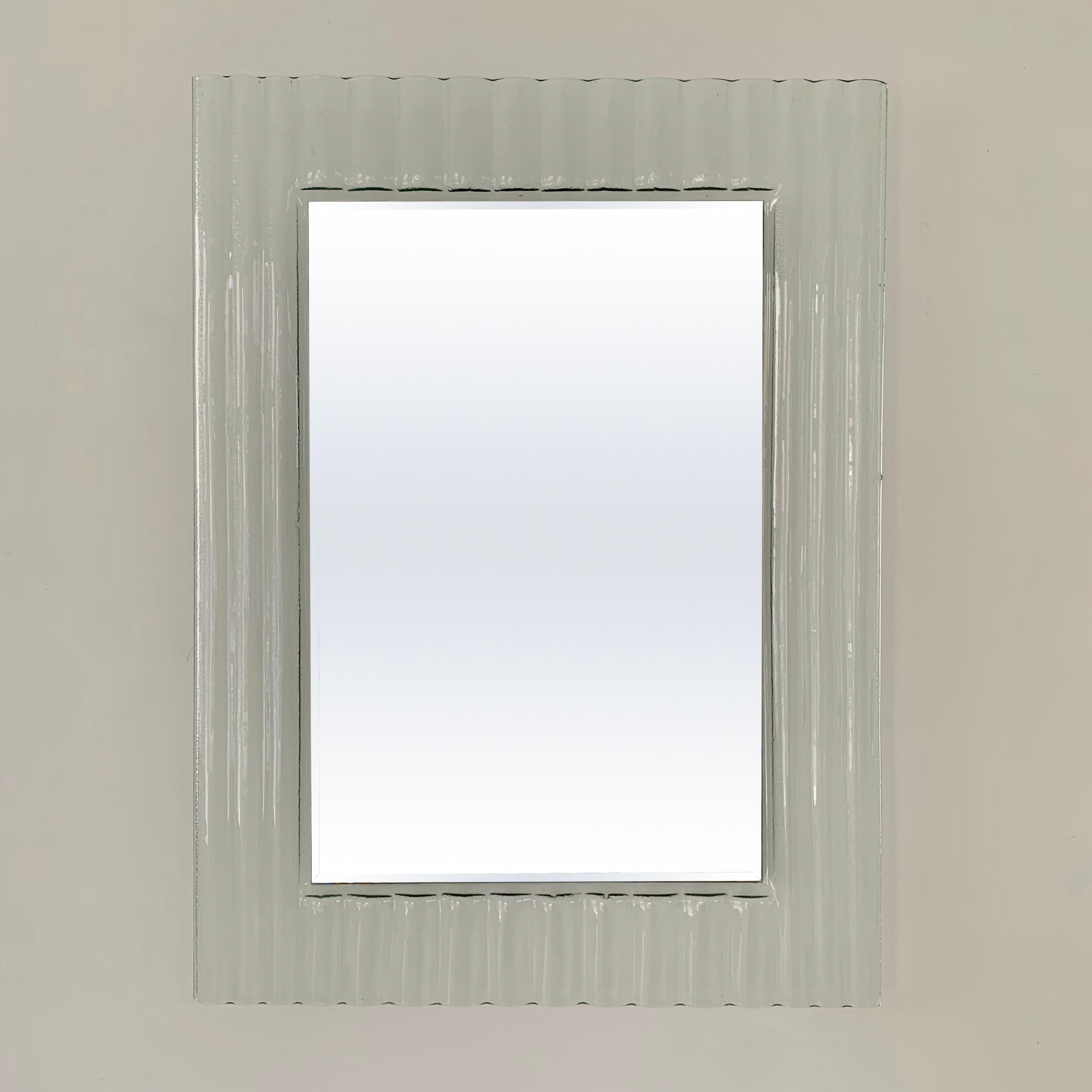 Elegant italian rectangular mirror, circa 1980, Italy.
Ripple effect Murano glass.
Ron Arad Design attribution.
Dimensions: 80 cm H, 60 cm W, 3 cm D.
Good original condition, no cracks.
All purchases are covered by our Buyer Protection