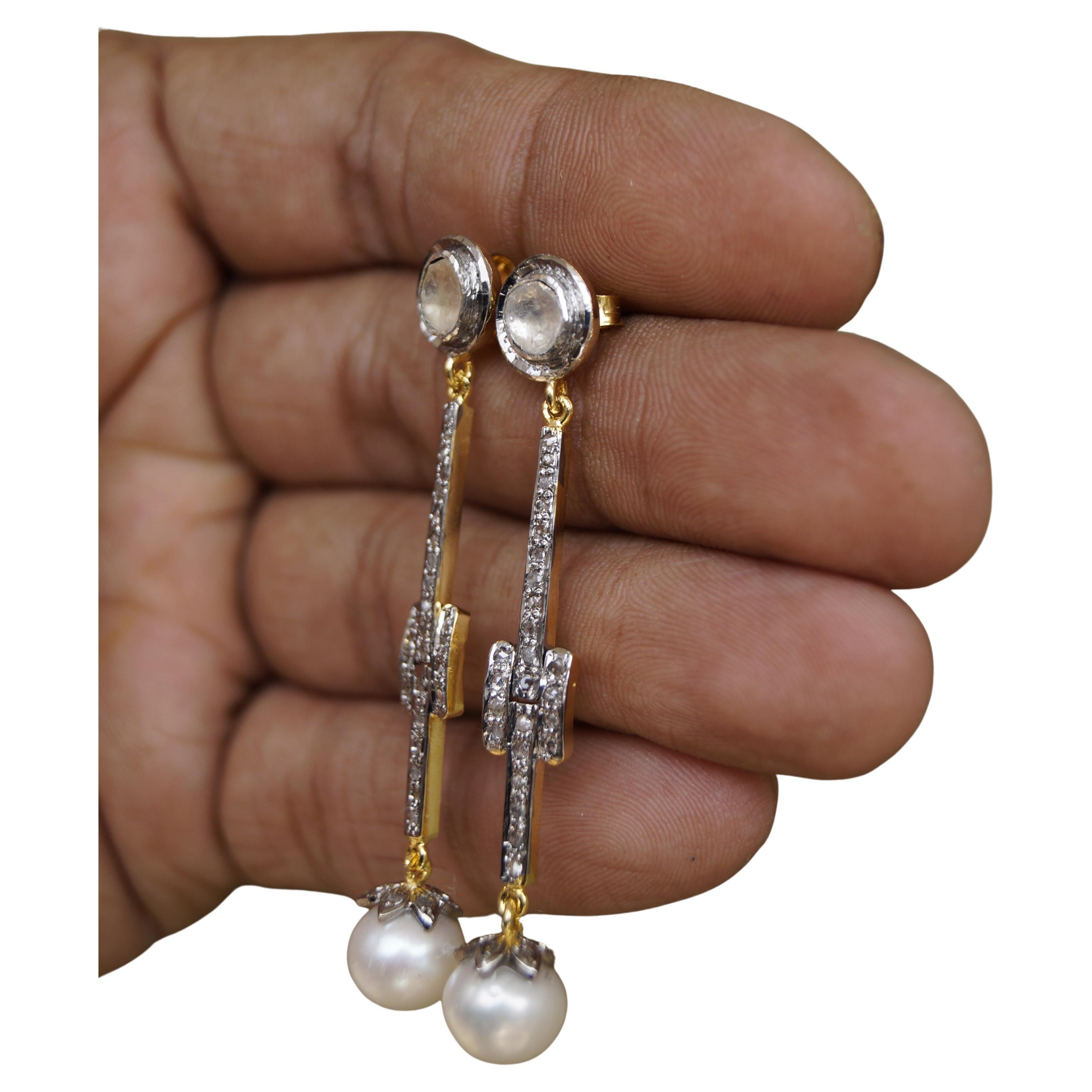 The beautiful elegant natural diamond natural button pearl sterling silver dangle earrings consists of-

Diamond type- Natural Uncut diamonds
Diamond color- White 

Metal- sterling silver 
Metal Purity- 92.50% Pure
Metal color- oxidized silver look