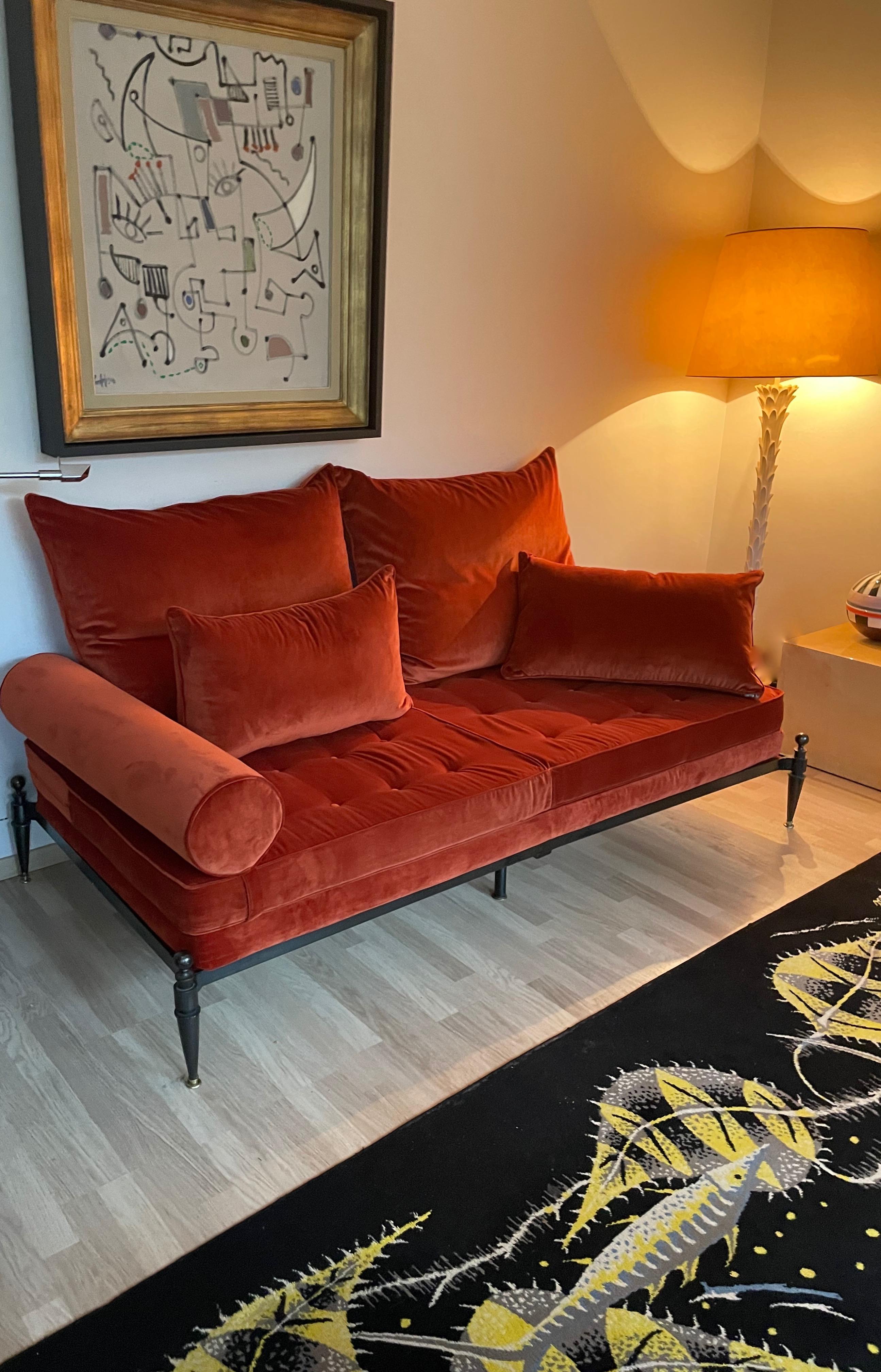 Neoclassical bronze sofa recently reupholstert in rust color velvet ( City velvet collection CarluccI - JAB ), feat cushions, two  bolsters available.
Designed by Jaques Quinet-France.
Circa 1948.