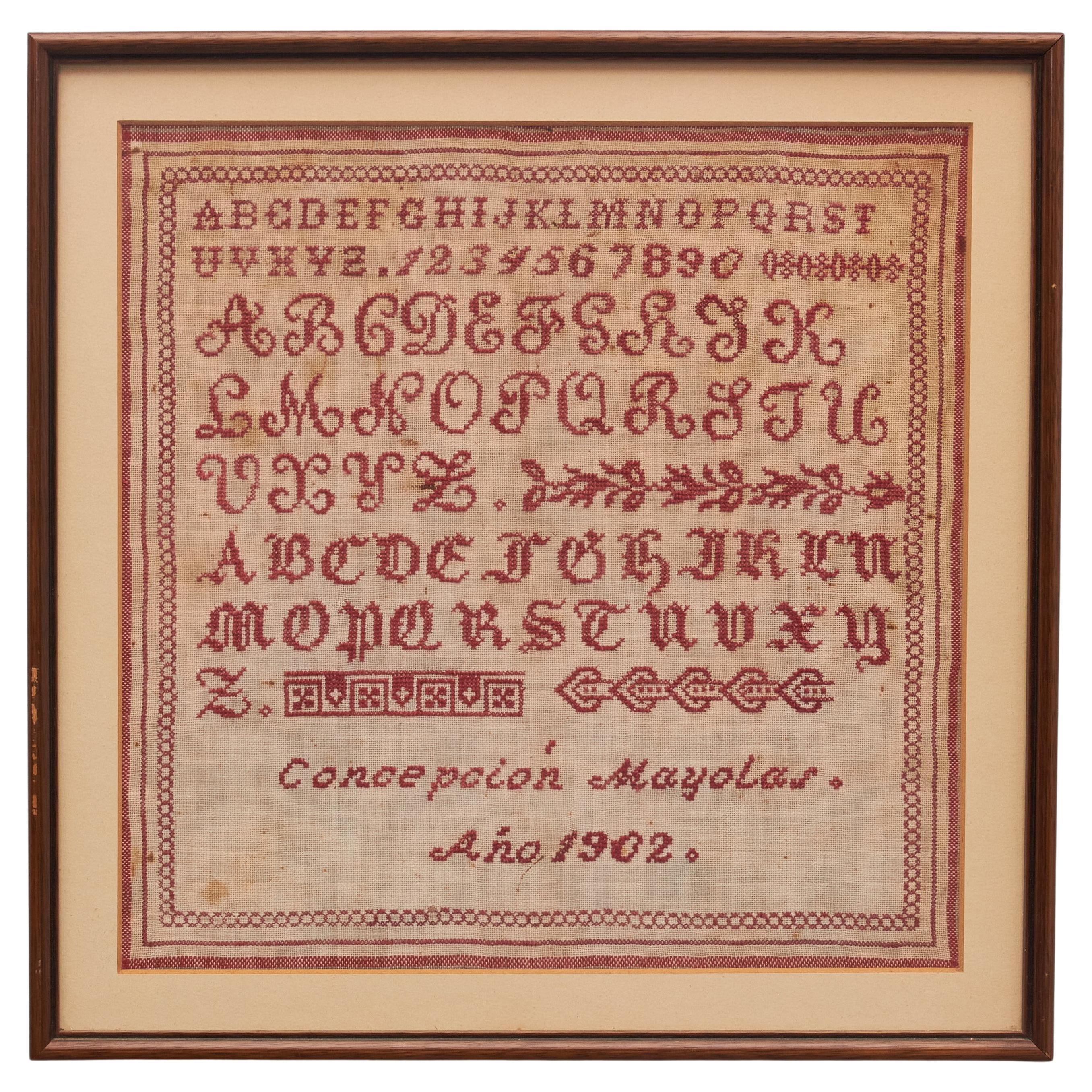 Elegant Nostalgia: Vintage 20th Century Cross-Stitch Sampler - Red on White For Sale