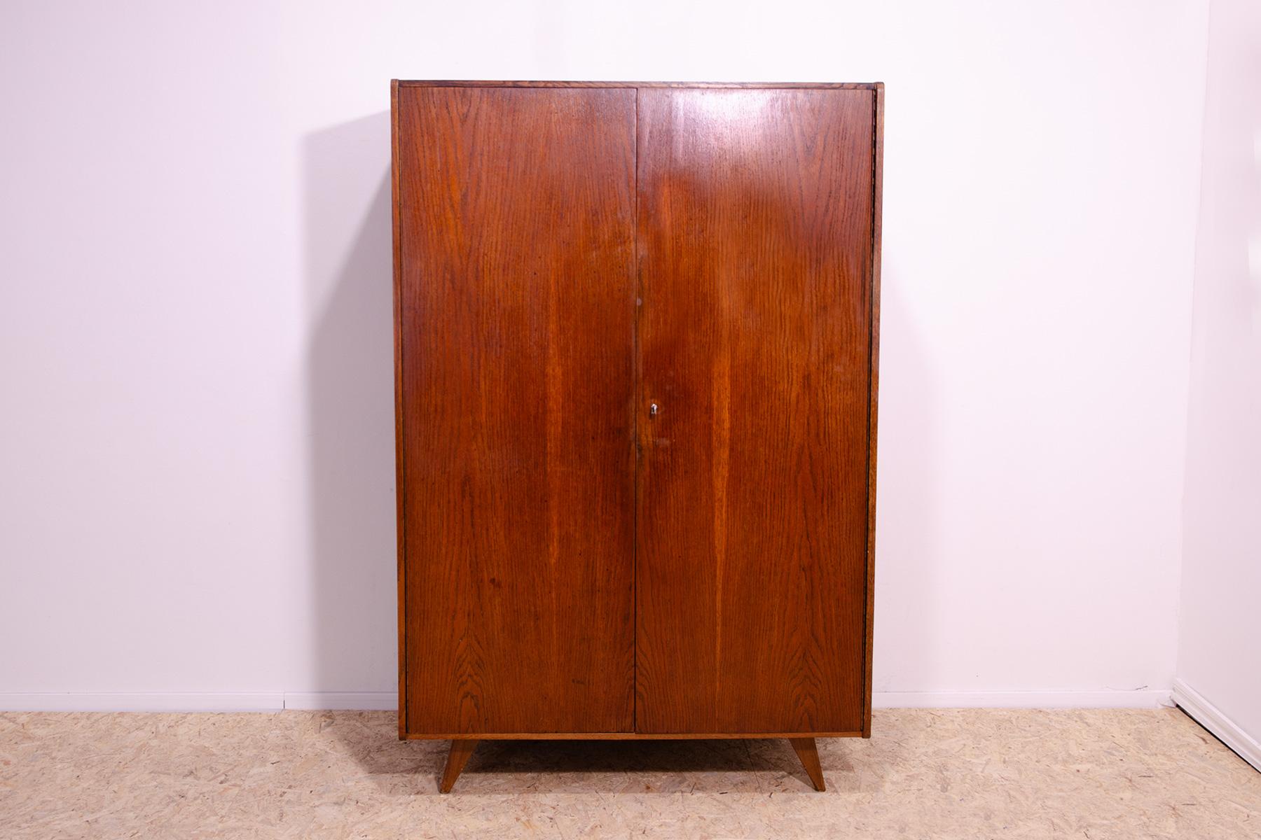 Mid century wardrobe, catalogue No. U-450, designed by Jiri Jiroutek. It´s made of beechwood, veneer, plywood.

The cabinet comes from the famous Universal series (U-450), which was designed in 1958 for the Czechoslovak national company Interiér