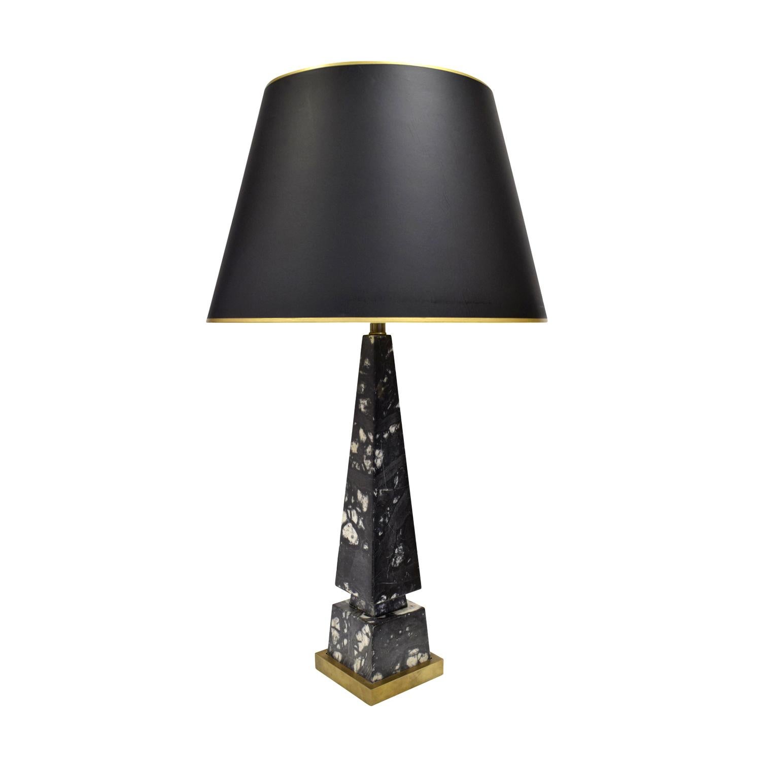 Elegant table lamp, obelisk form in black and white figured marble with bronze base and hardware, American 1940's.

Measures: Shade diameter 18 inches 
Shade height 12.5 inches.