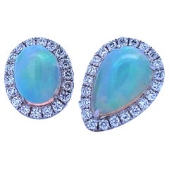 Elegant Opal and Diamond Ring