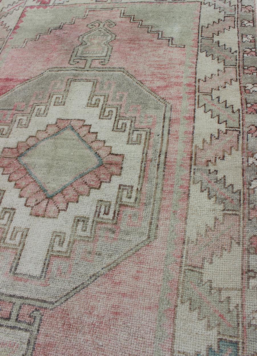 Wool Elegant Oushak Rug from Turkey with Tribal Medallion Design in Light Colors For Sale