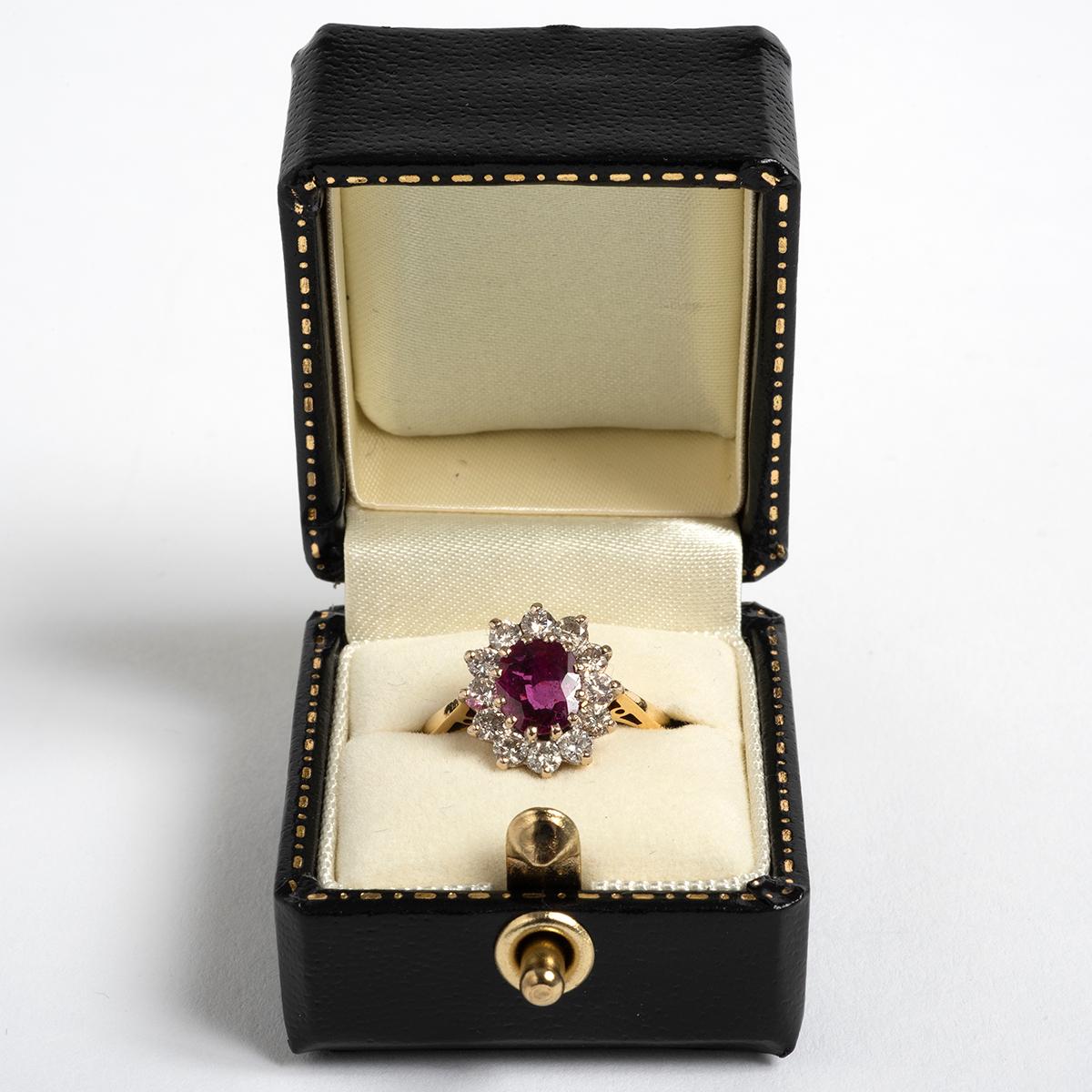 Elegant Oval Ruby & Diamond Cluster Ring, Approx 0.50carat In Excellent Condition For Sale In Canterbury, GB