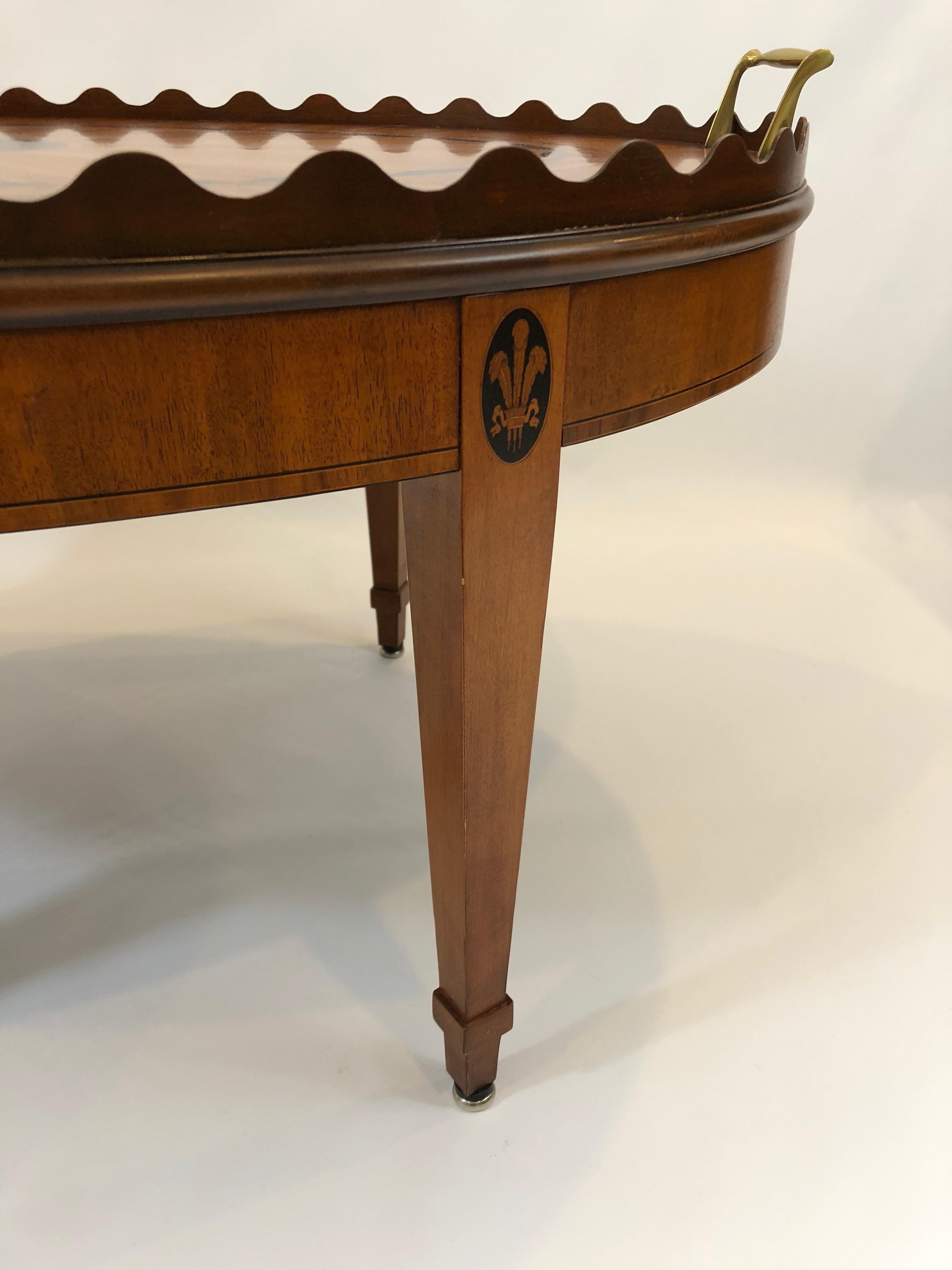 Elegant Oval Satinwood Fan Inlaid Cocktail Table with Scalloped Edge In Excellent Condition In Hopewell, NJ