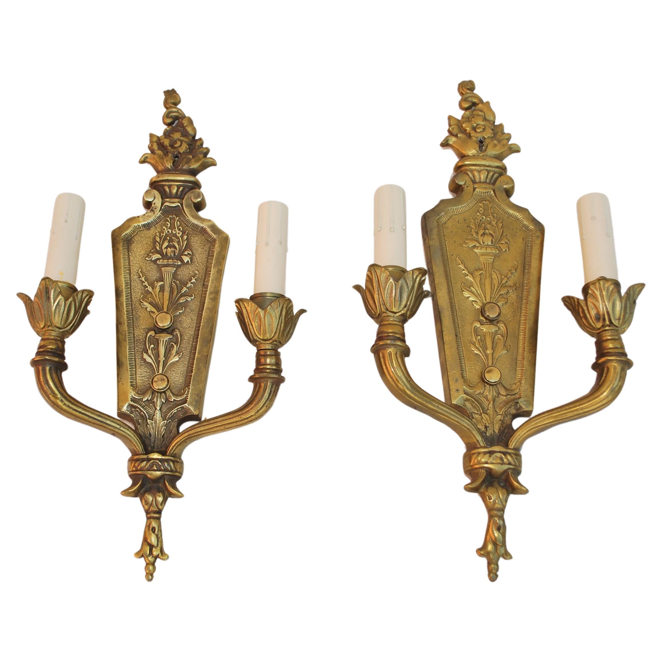 Elegant pair of 1920's brass sconces For Sale