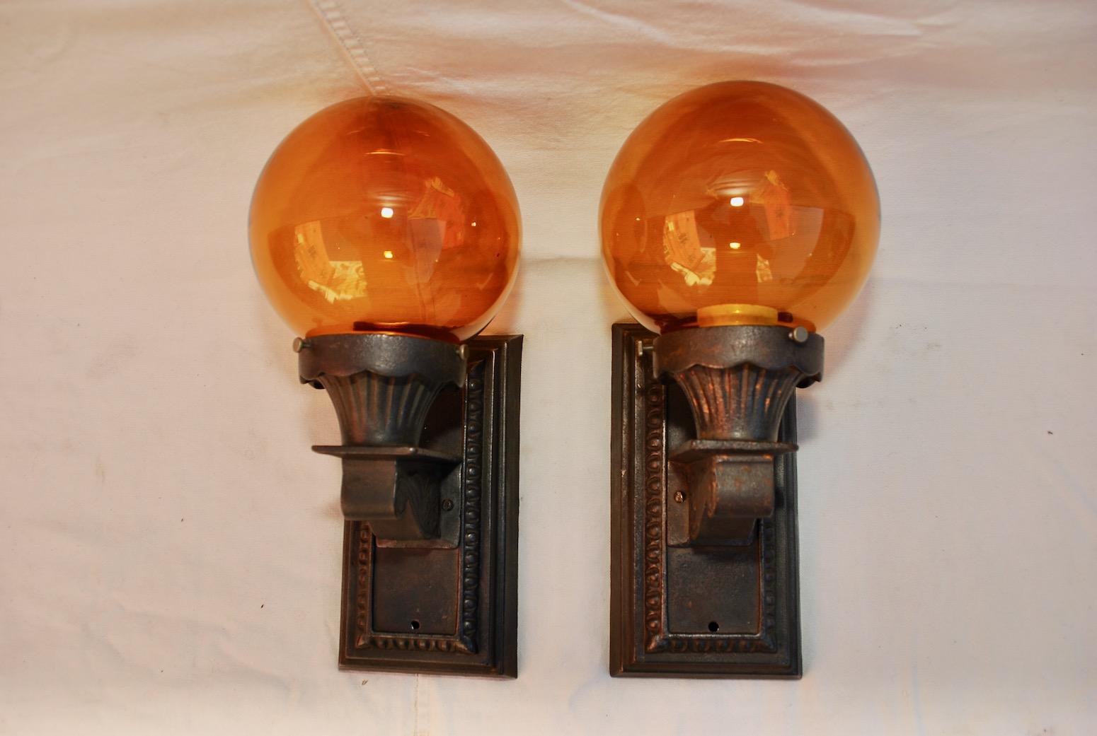 Elegant Pair of 1920s Cast Iron Outdoor Sconces In Good Condition In Los Angeles, CA