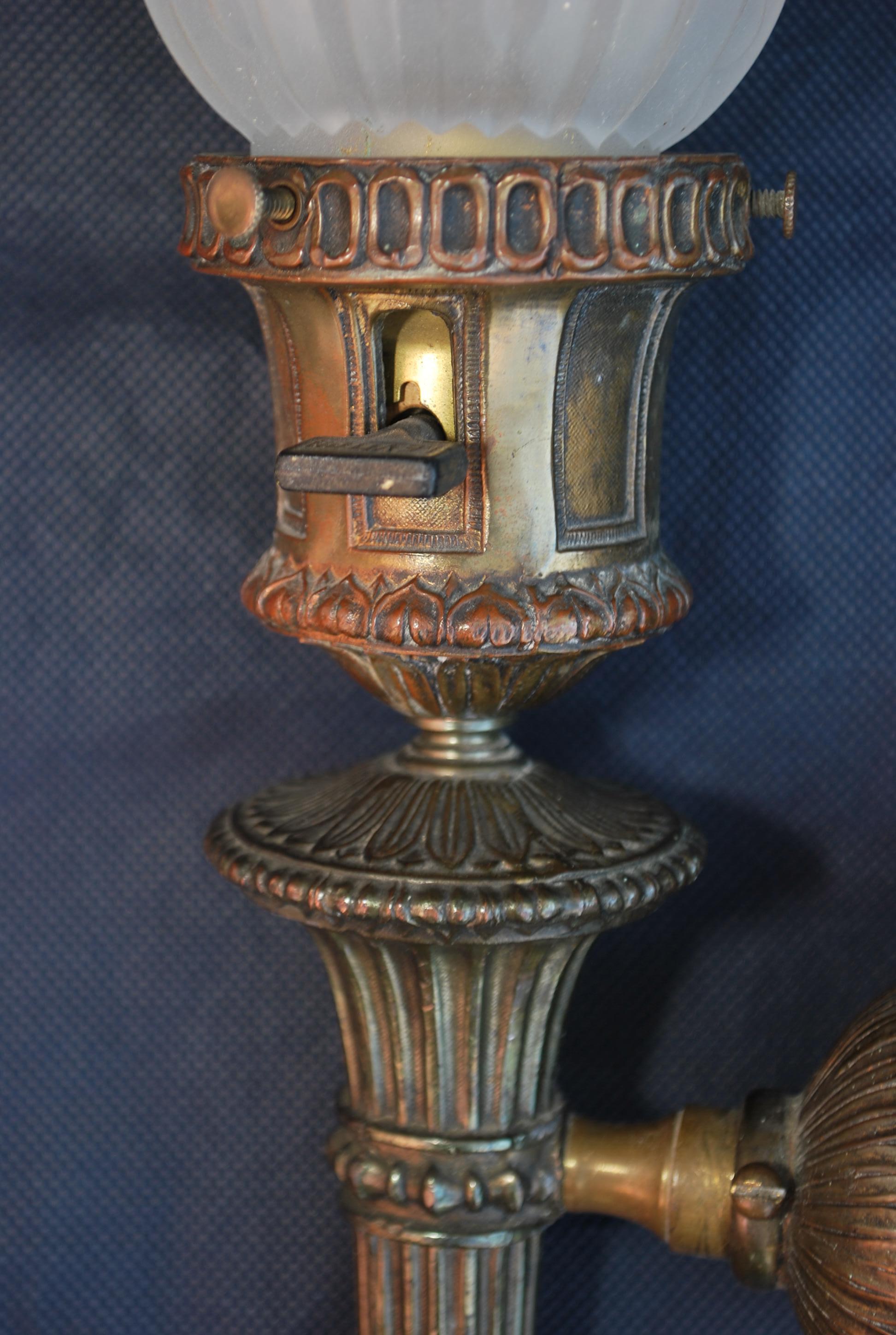 Metal elegant pair of 1920's silver plated sconces For Sale