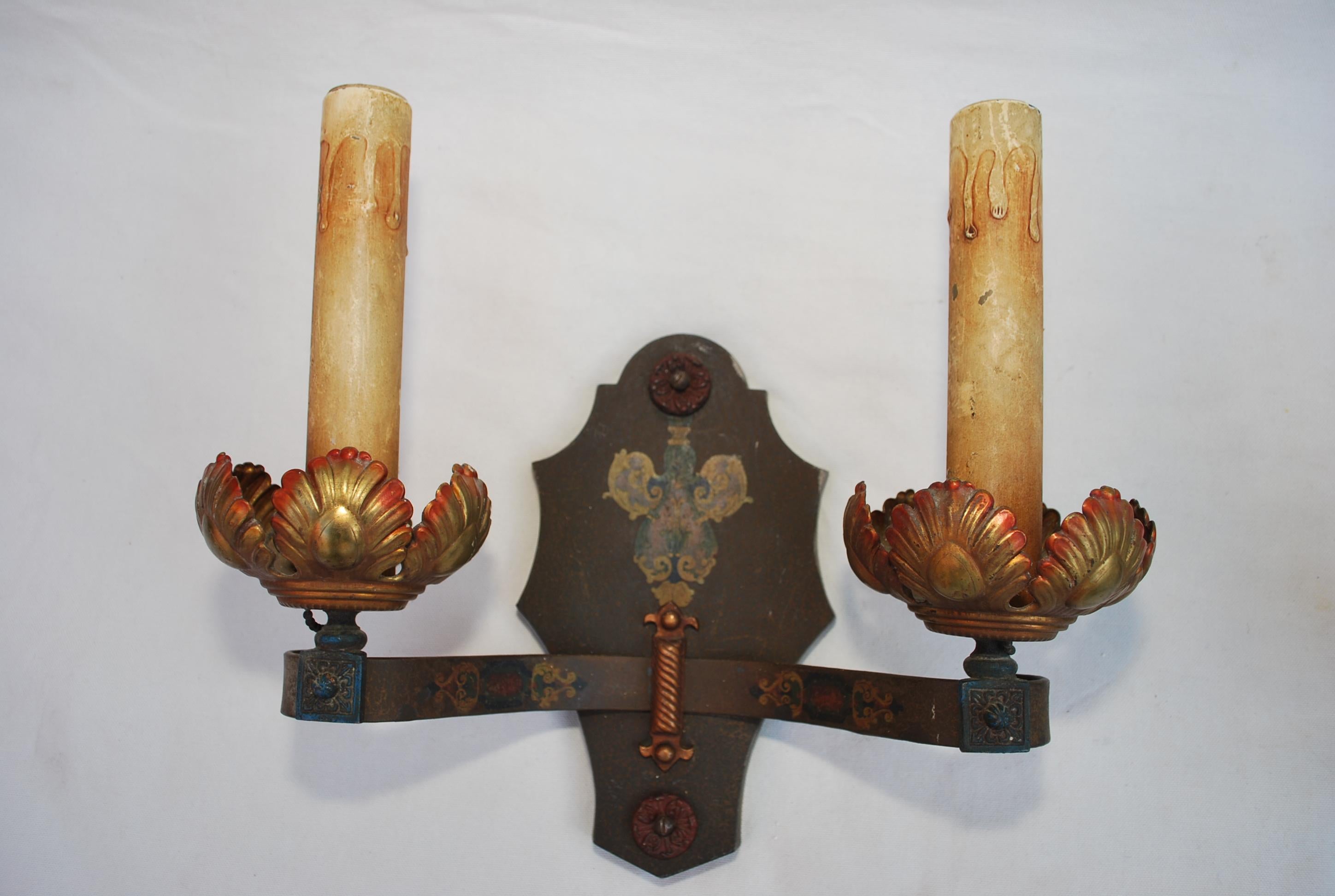 An elegant pair of 1920's sconces, the patina is so much nicer in person