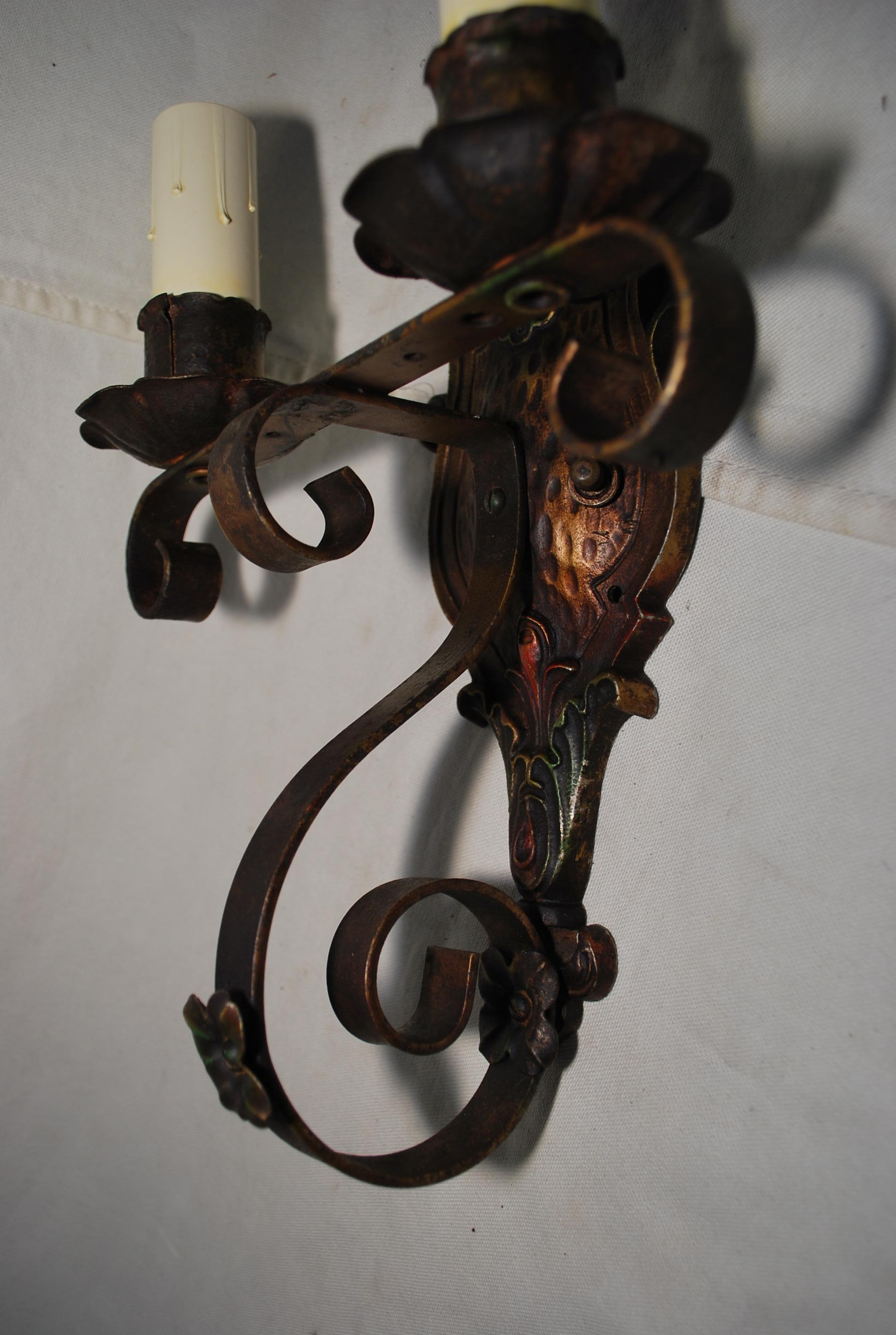 American elegant pair of 1920's wrought iron sconces For Sale