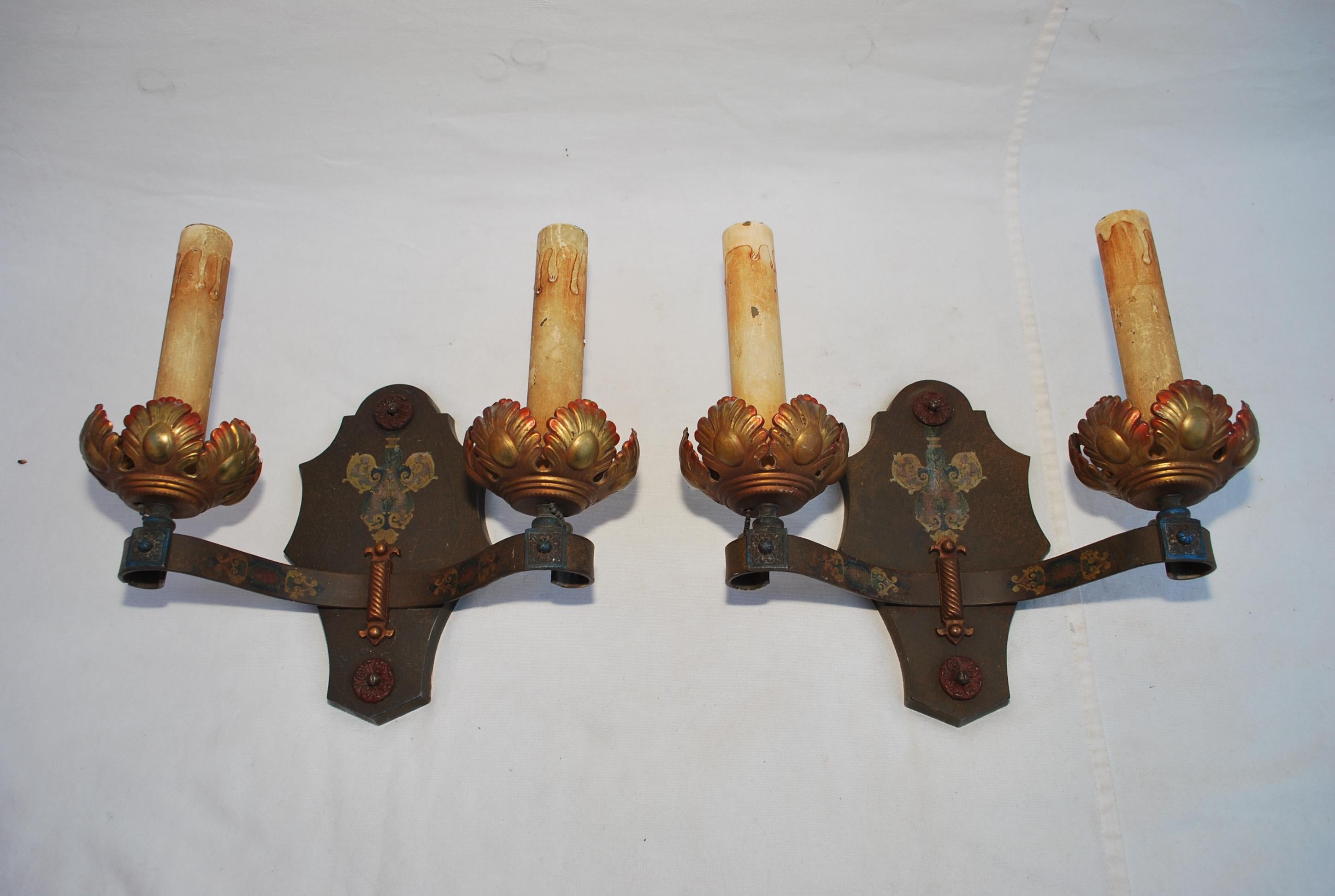 Metal elegant pair of 1920's wrought iron sconces For Sale
