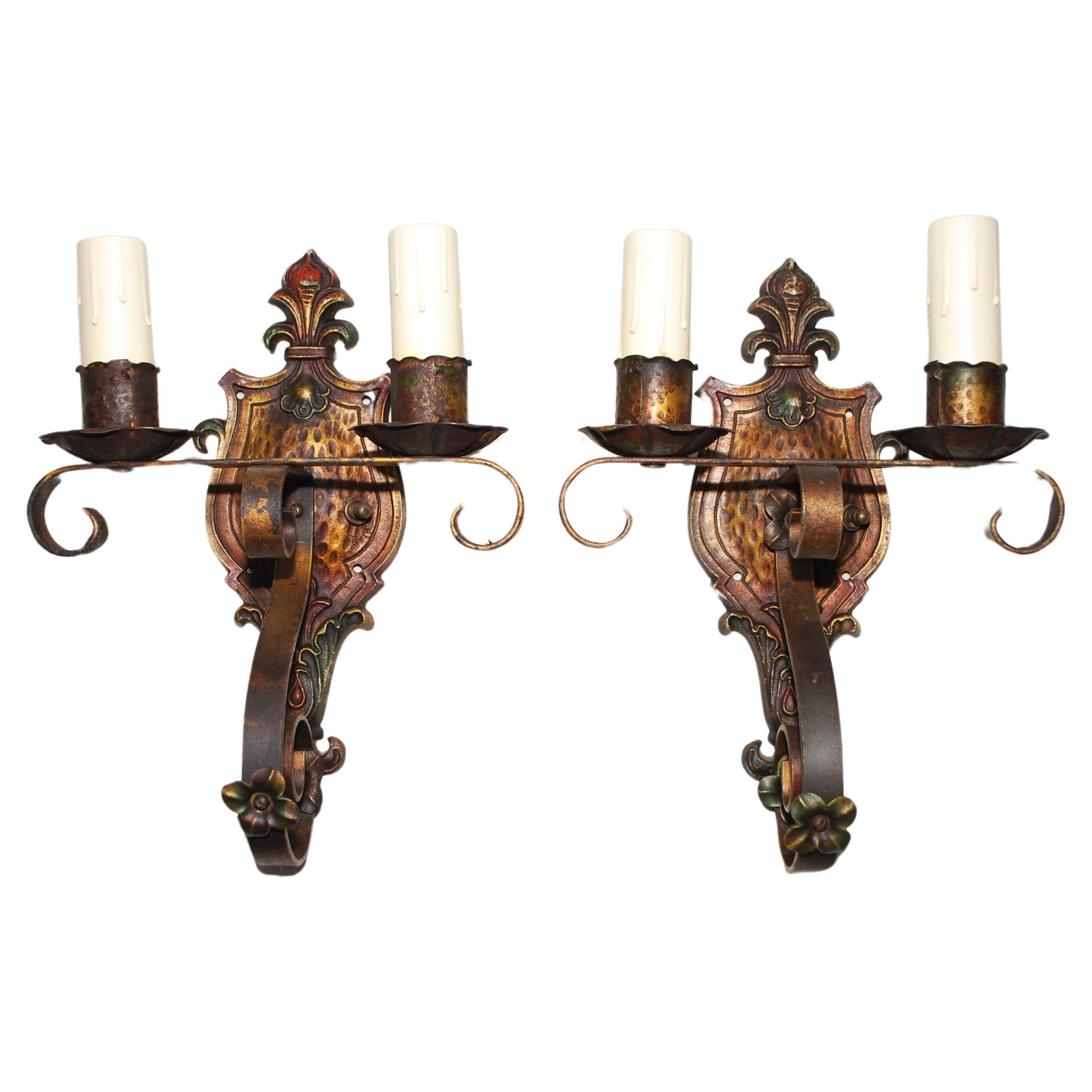 elegant pair of 1920's wrought iron sconces For Sale