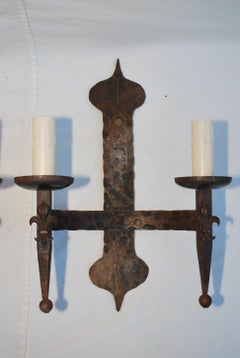 Elegant pair of 1930's wrought iron sconces