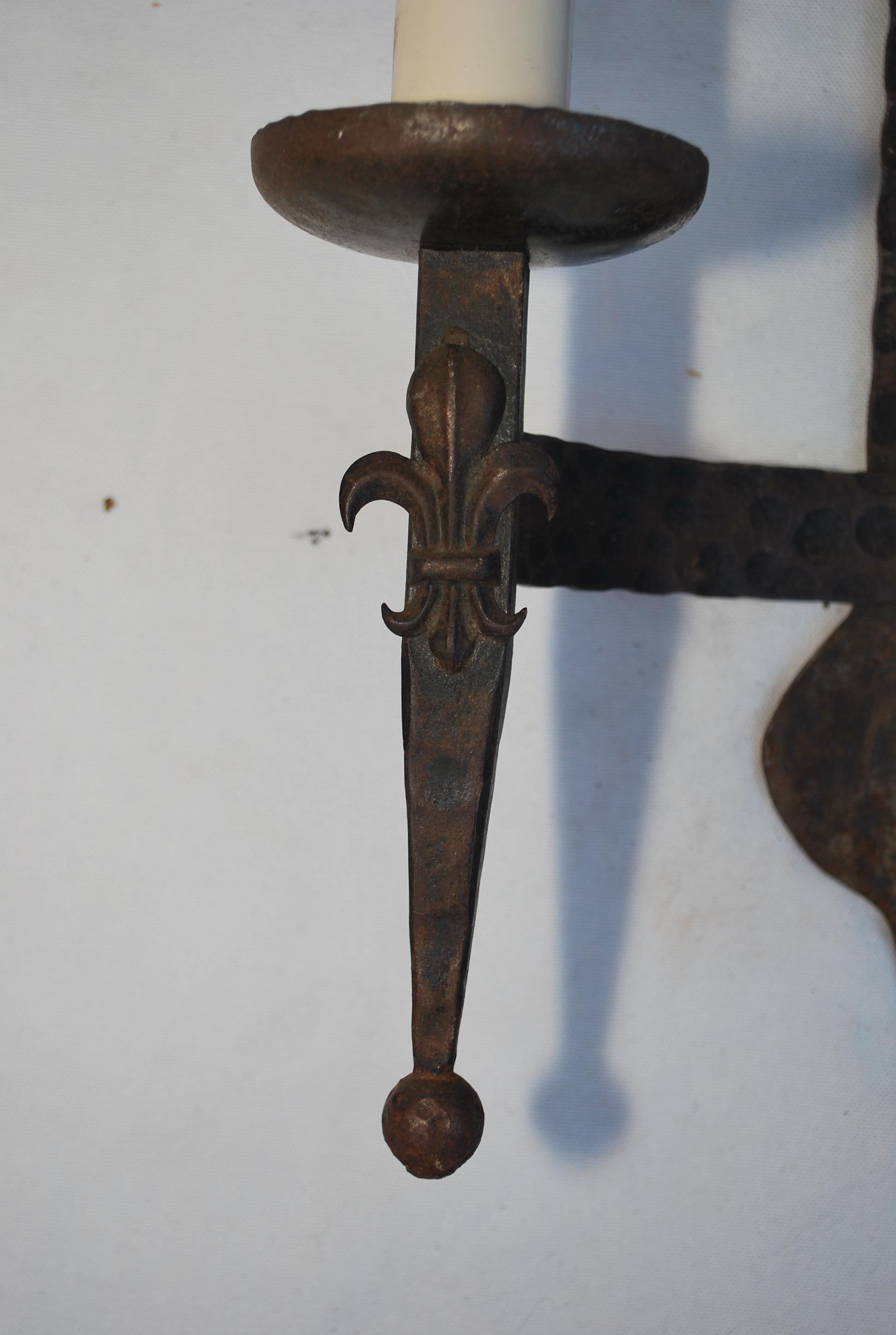 Mid-20th Century Elegant pair of 1930's wrought iron sconces For Sale