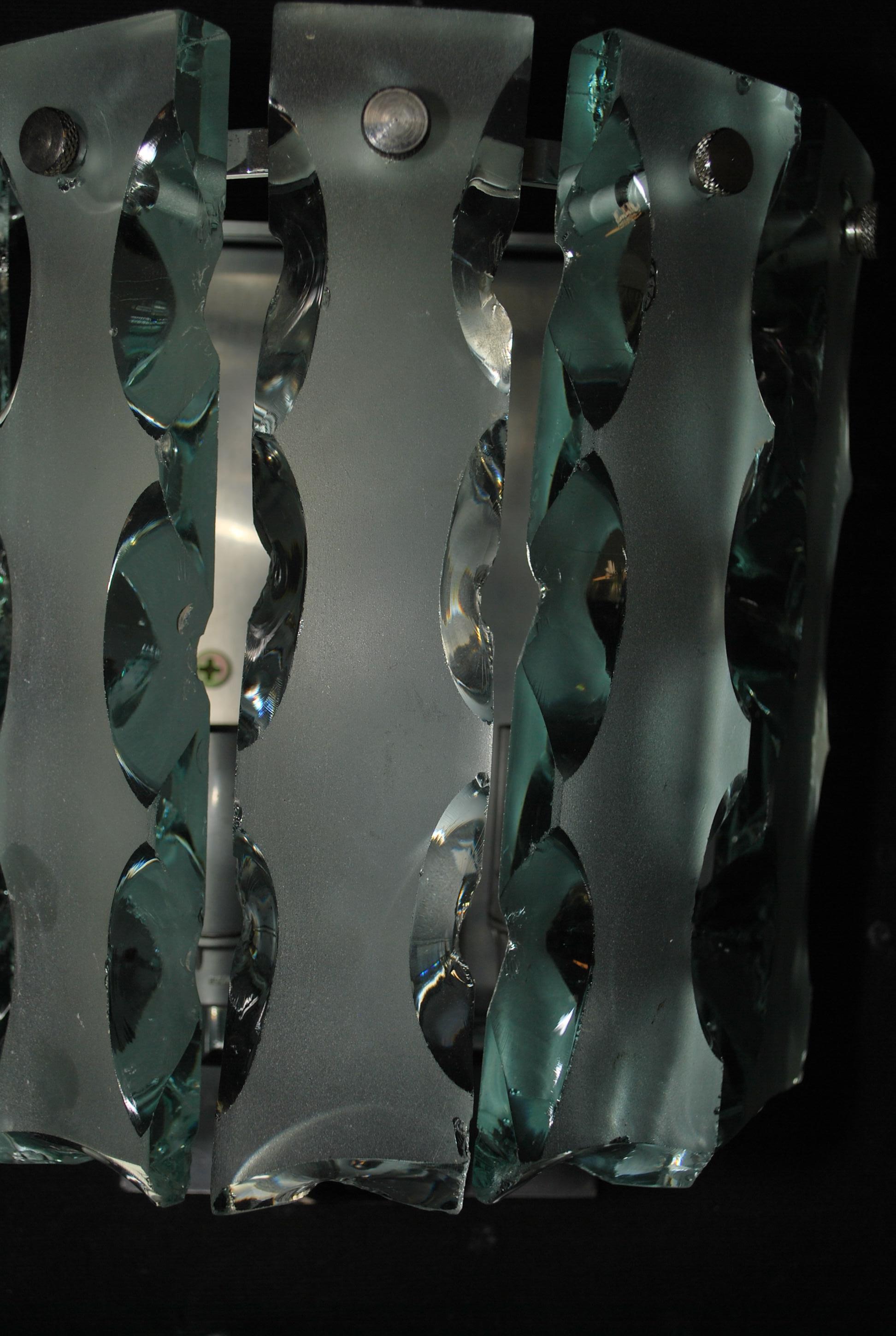 BEWARE THE SCONCES WERE TAKEN ON A BLACK FABRIC, THE GREEN LOOK DARKER, BUT   ACTUALLY IT IS A LITTLE LIGHTER, just want to make sure,  I am not trying to deceive  my clients, it is just the glass look better on a dark fabric