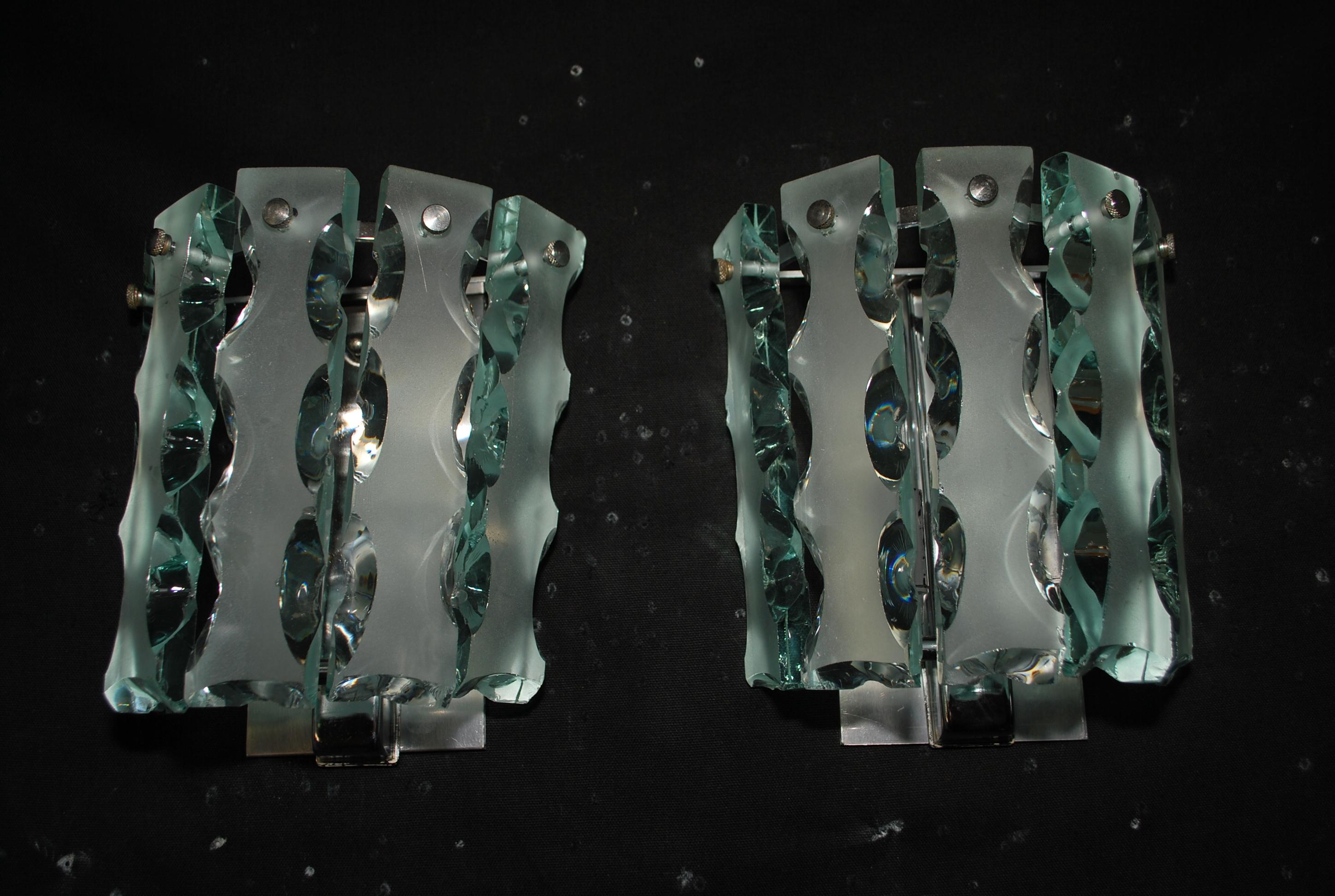 Metal elegant pair of 1970's Italian sconces design by Cristal Arte For Sale