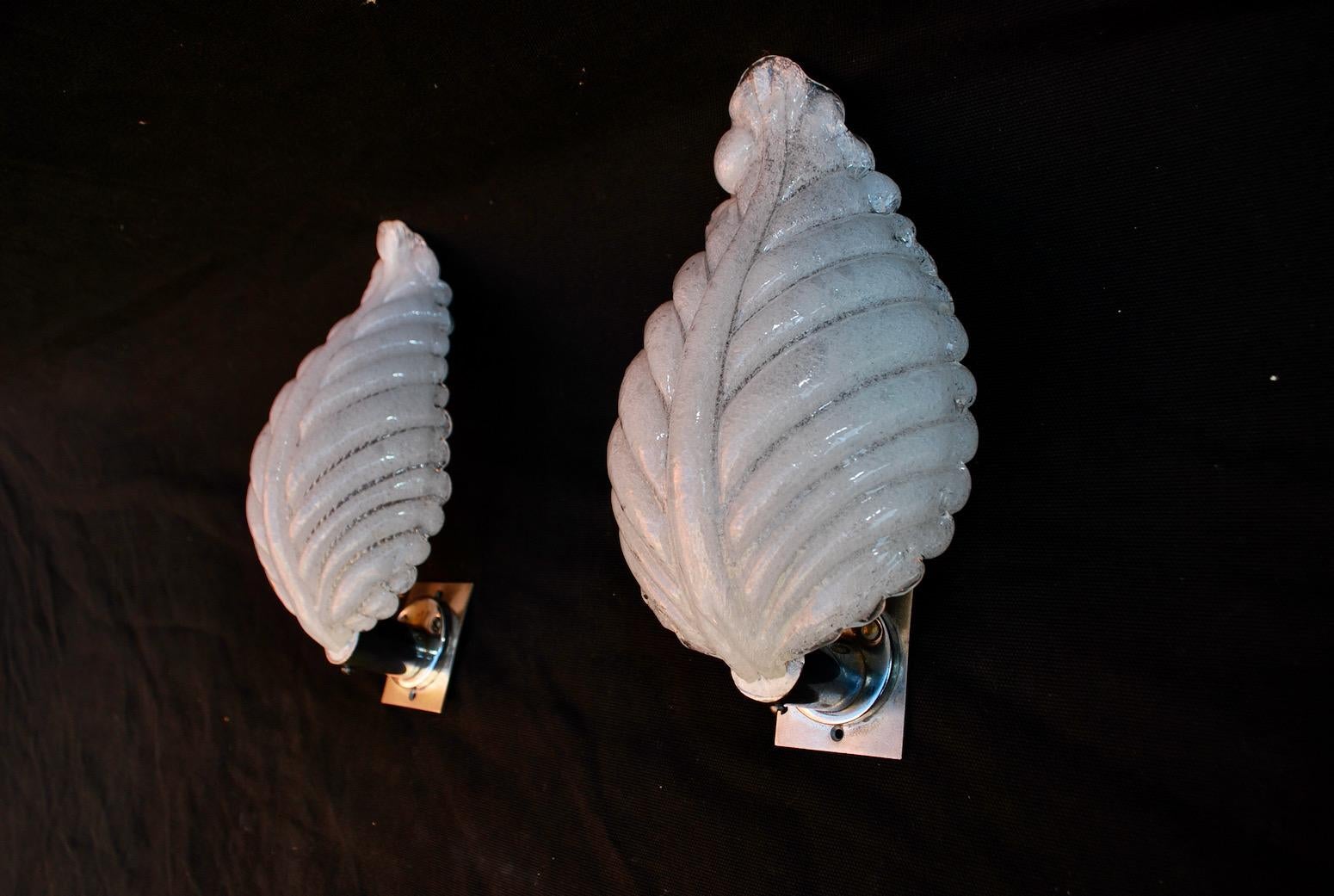 A beautiful pair of 1970s hands blown Murano glass sconces.