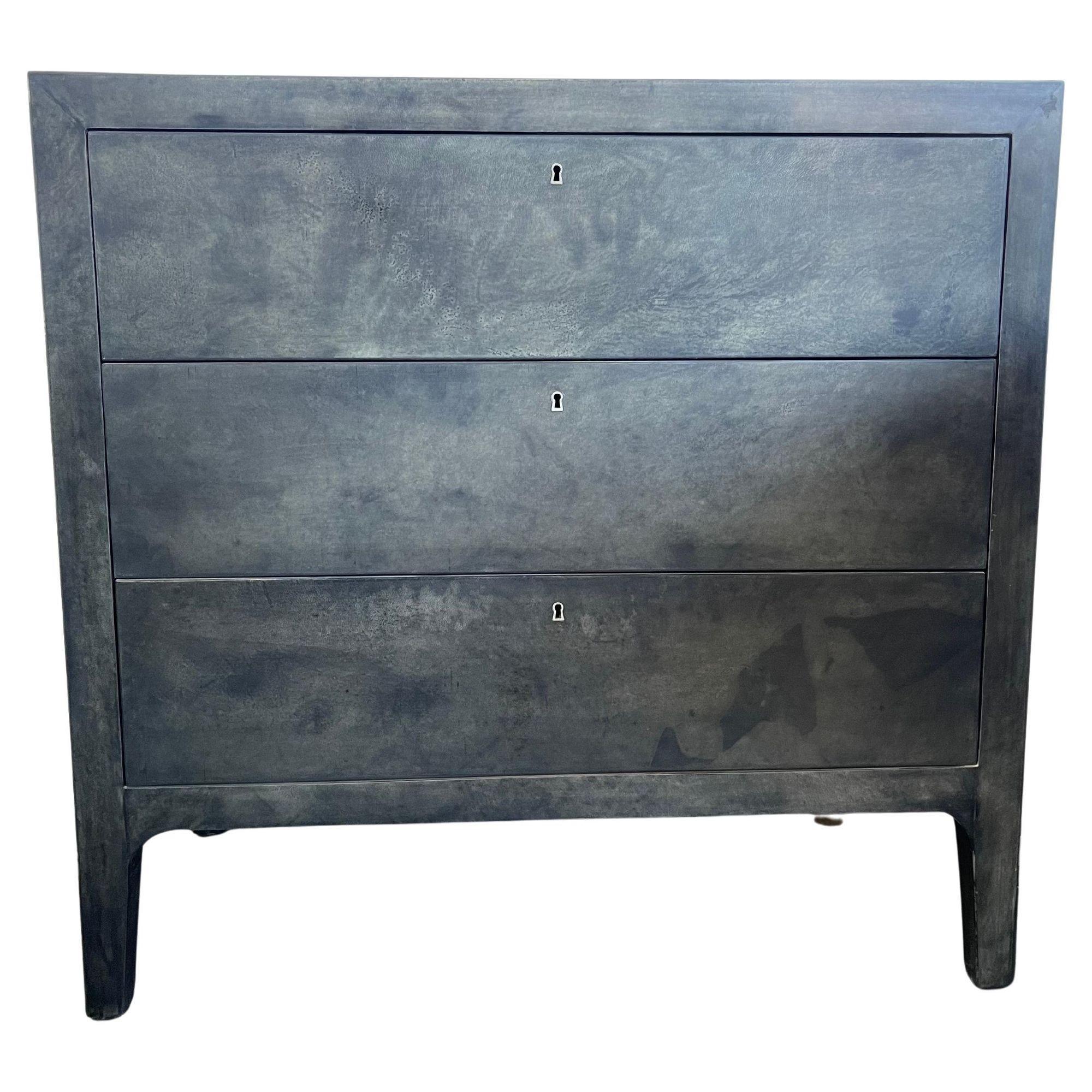 Stunning pair of Italian goatskin commodes, crafted in the 1980s. Featuring a chic matte charcoal finish, these pieces blend modern design with luxurious materials, making them a perfect addition to any stylish interior.
These commodes offer ample