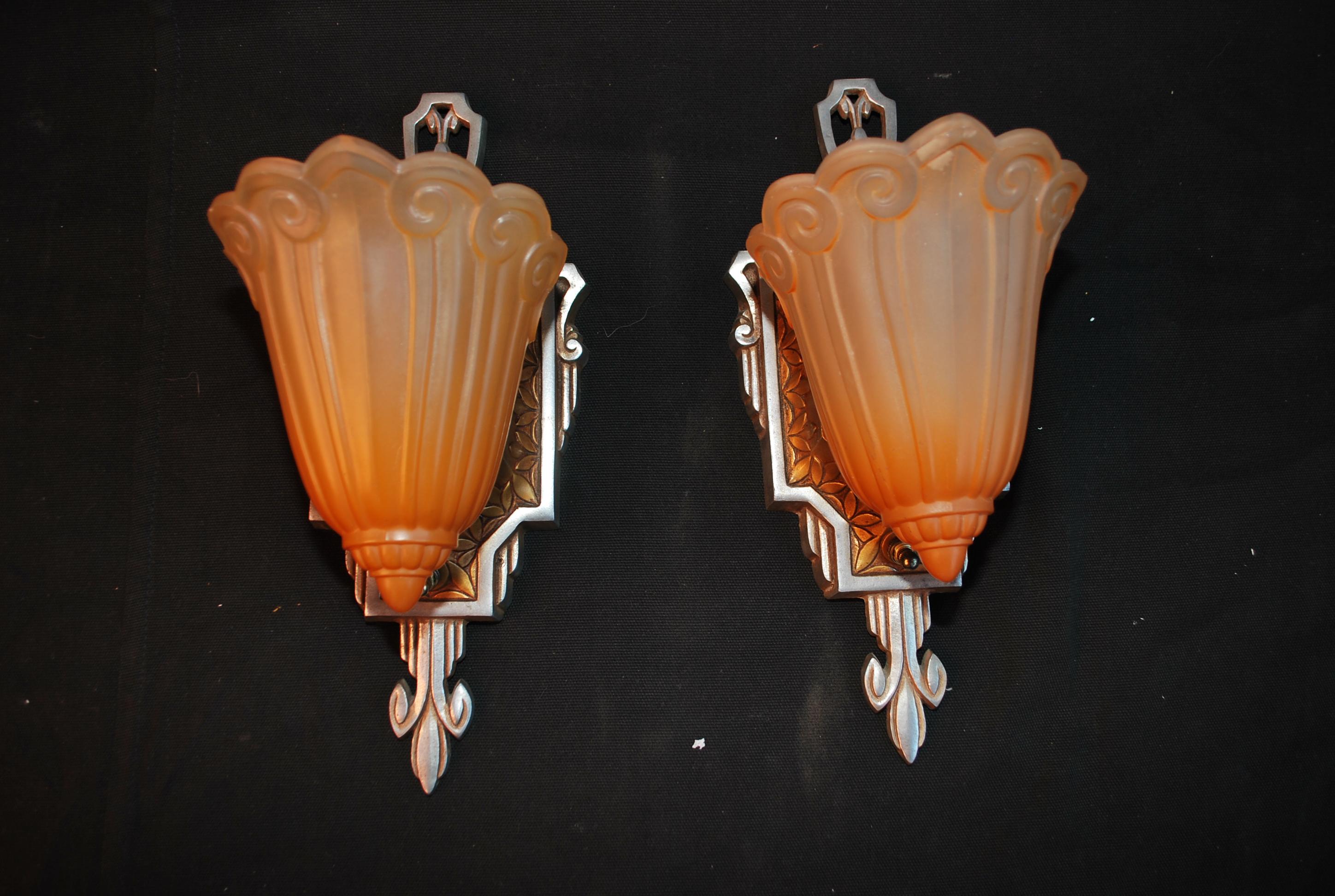  A beautiful and elegant pair of 1920's sconces, the patina is allot nicer in person
