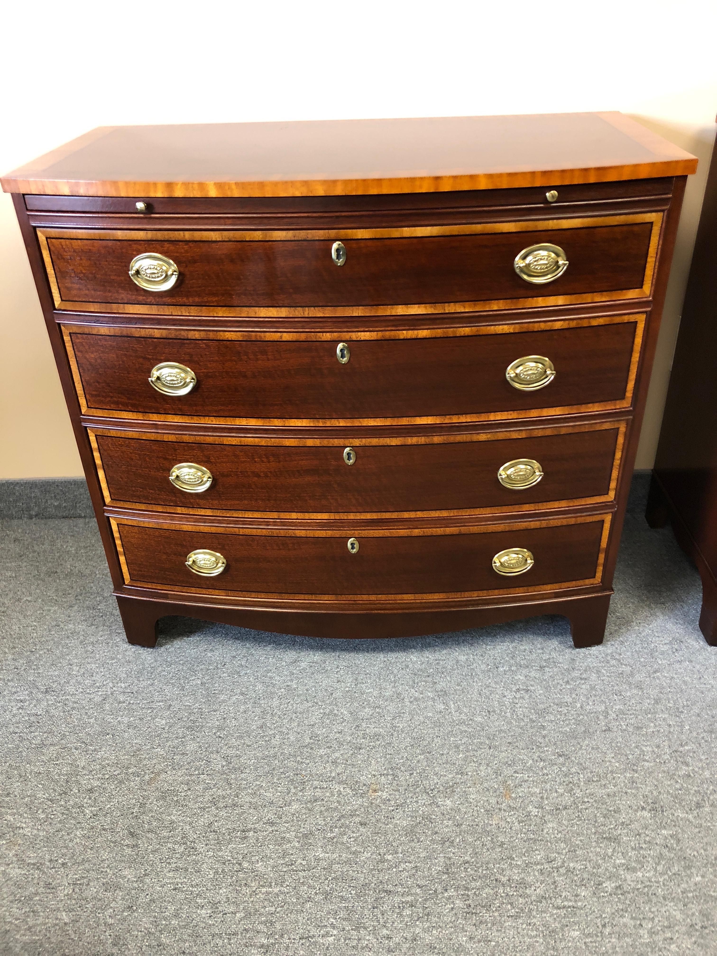 Two very handsome chests of drawers commodes by Baker, perfect as night stands, having ebony inlay and satinwood borders, a pullout / pull-out slide (10.25 deep) and 4 drawers in each.
Will sell one for $3000.