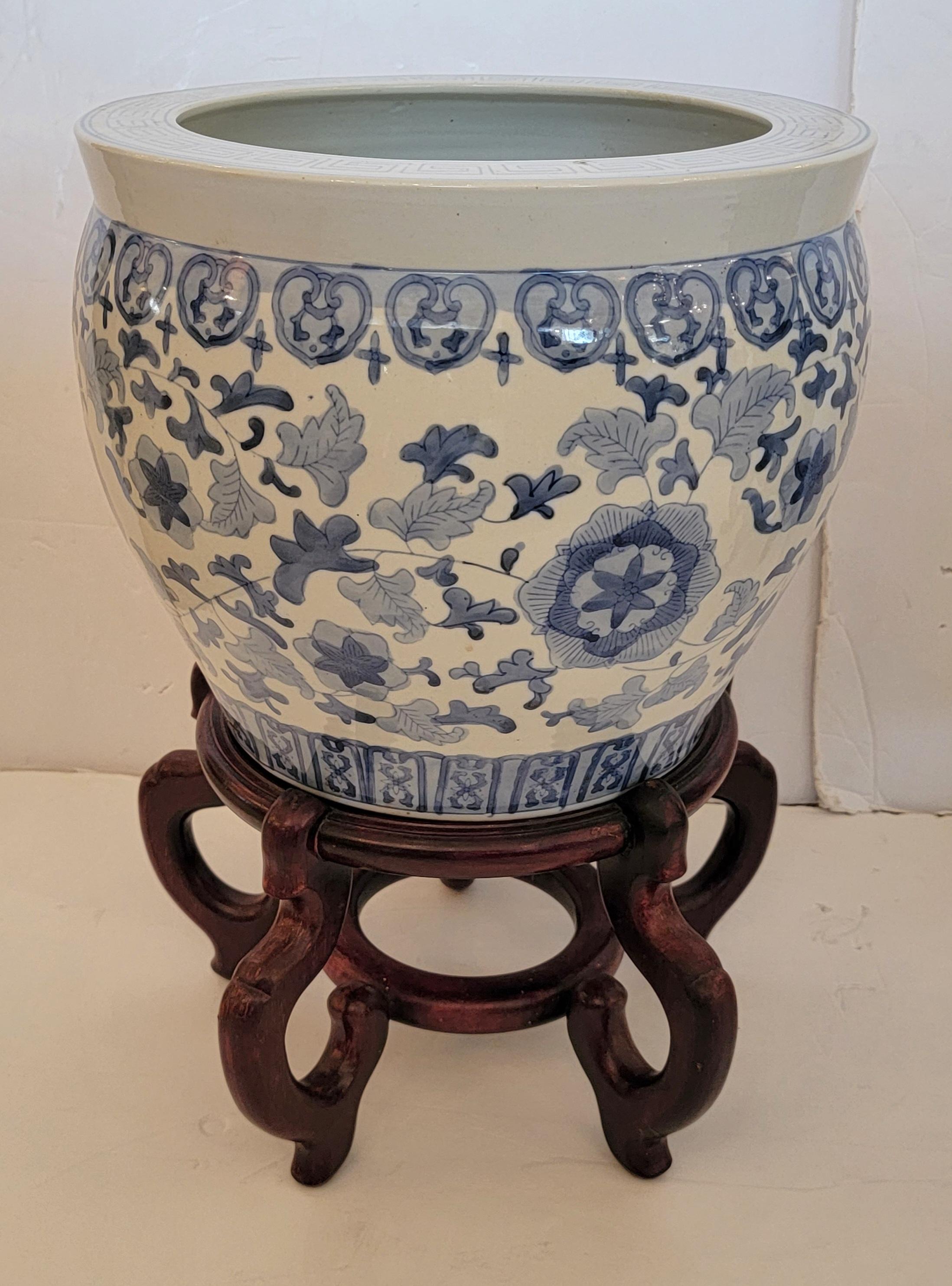 Chinese Export Elegant Pair of Blue & White Planters on Teak Stands For Sale