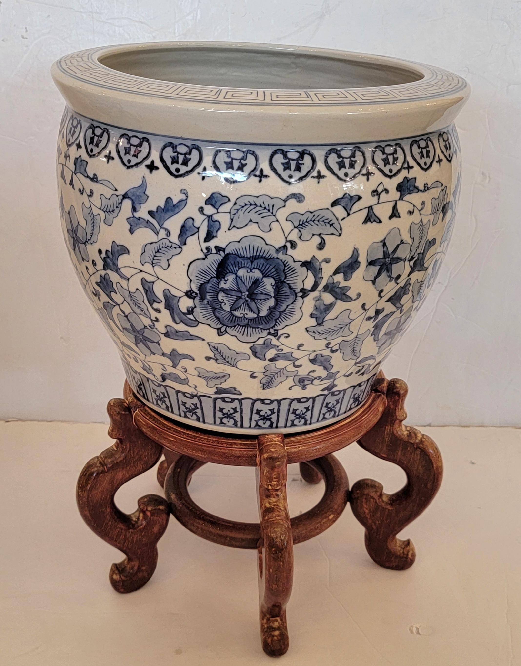 Chinese Elegant Pair of Blue & White Planters on Teak Stands For Sale