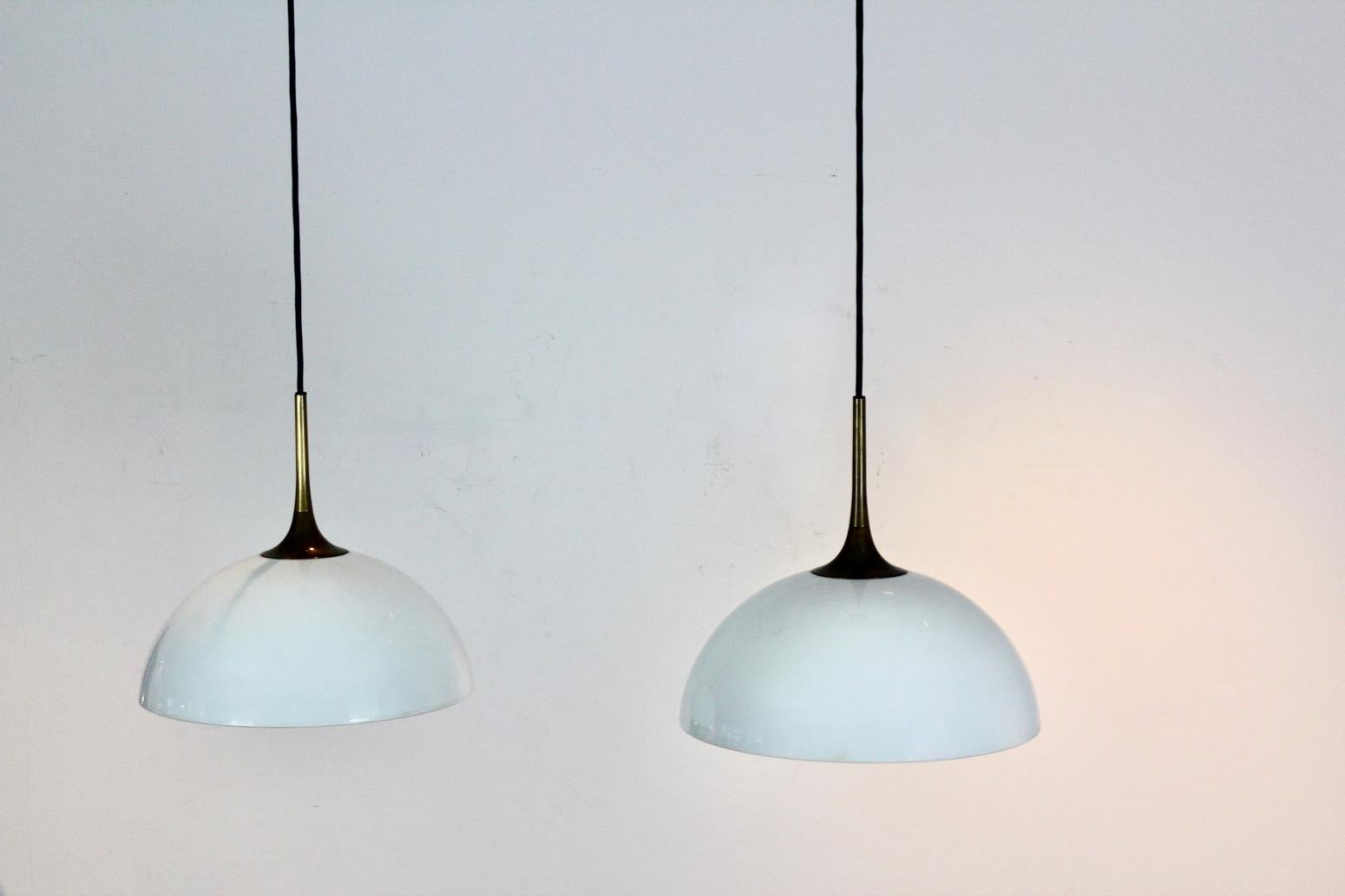 Elegant Pair of Brass and White-Opal Glass Pendant Lights by Florian Schulz For Sale 3
