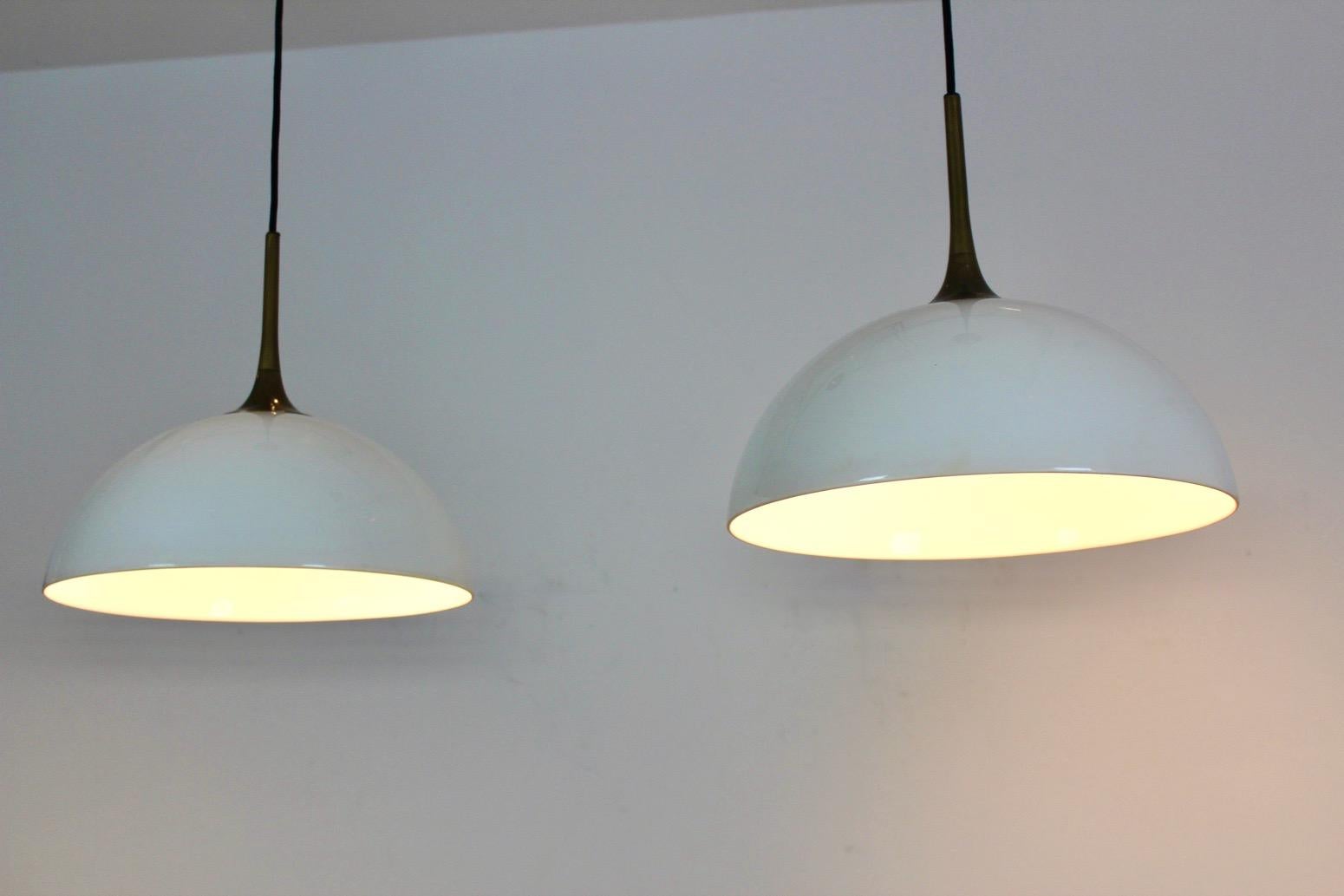 Elegant Pair of Brass and White-Opal Glass Pendant Lights by Florian Schulz For Sale 4