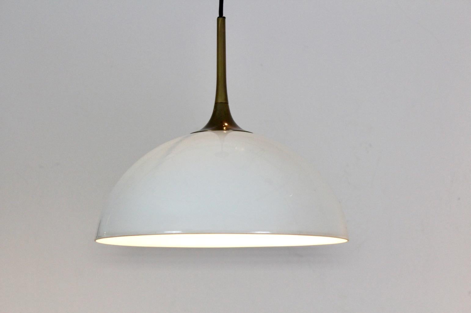 Mid-Century Modern Elegant Pair of Brass and White-Opal Glass Pendant Lights by Florian Schulz For Sale