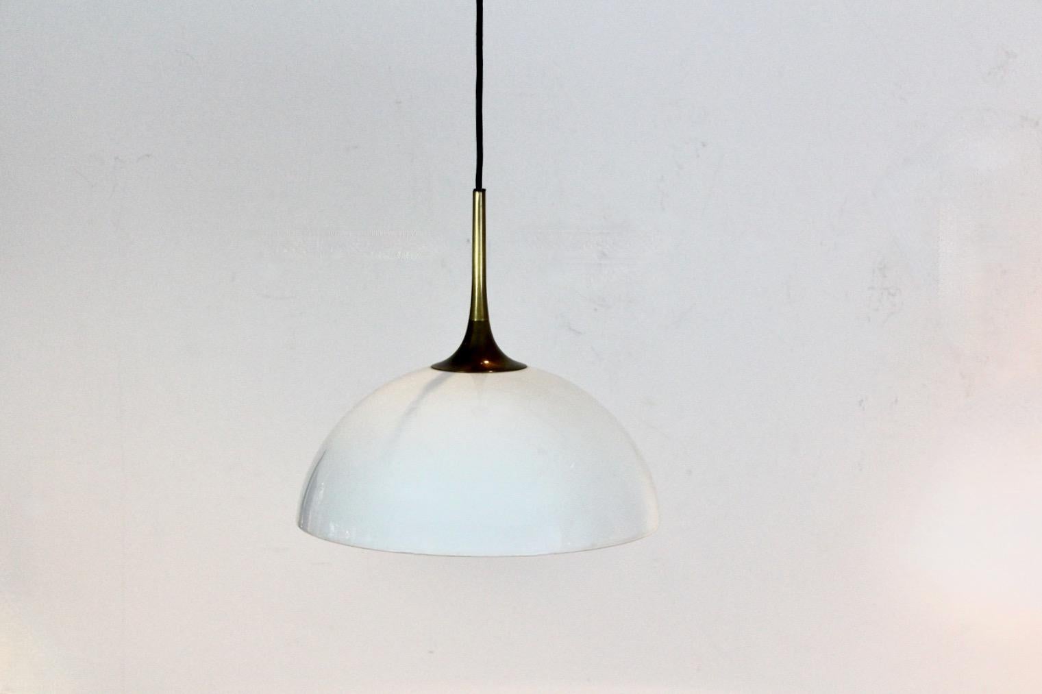 Elegant Pair of Brass and White-Opal Glass Pendant Lights by Florian Schulz In Good Condition For Sale In Voorburg, NL