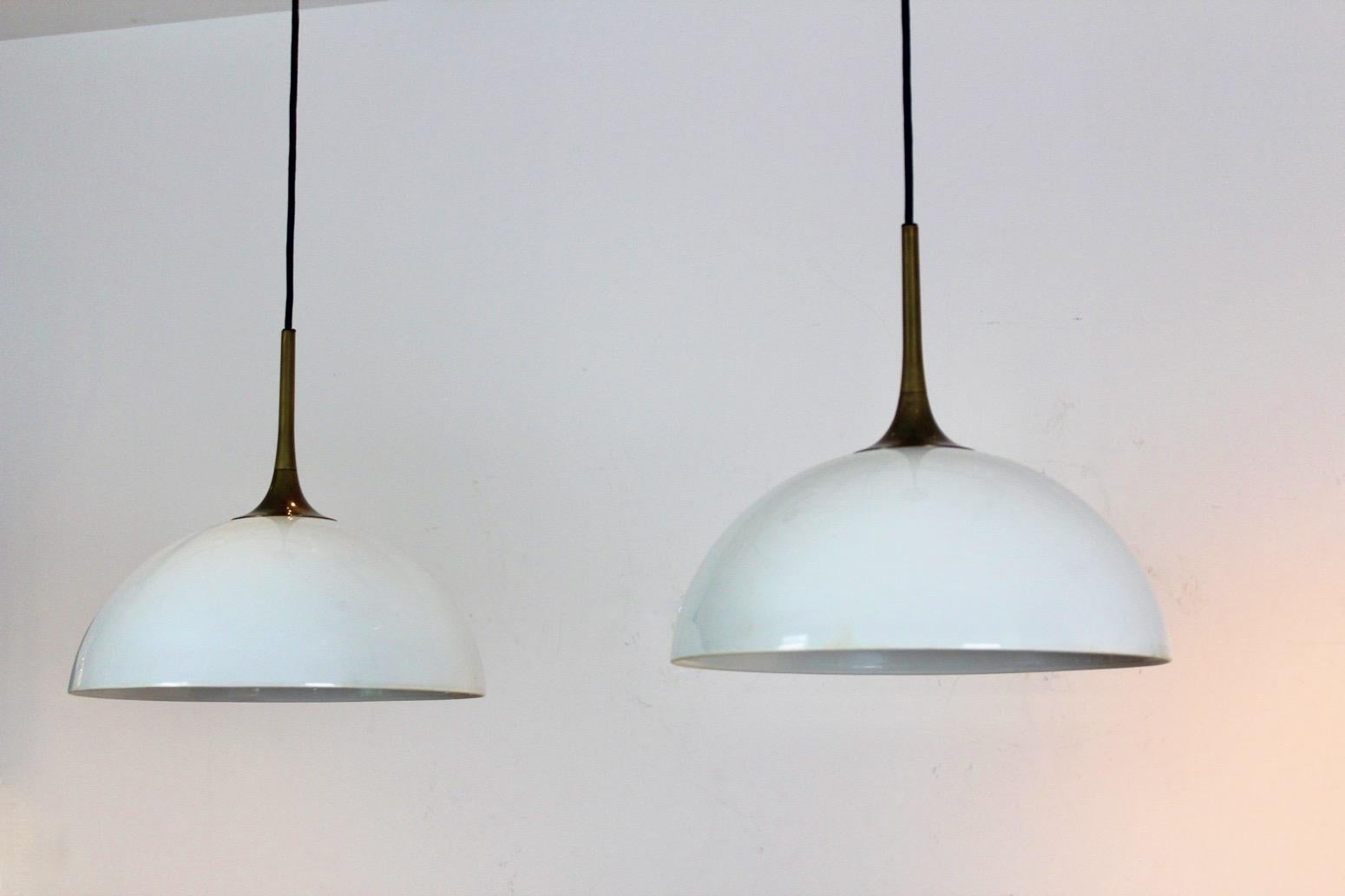 Elegant Pair of Brass and White-Opal Glass Pendant Lights by Florian Schulz For Sale 1