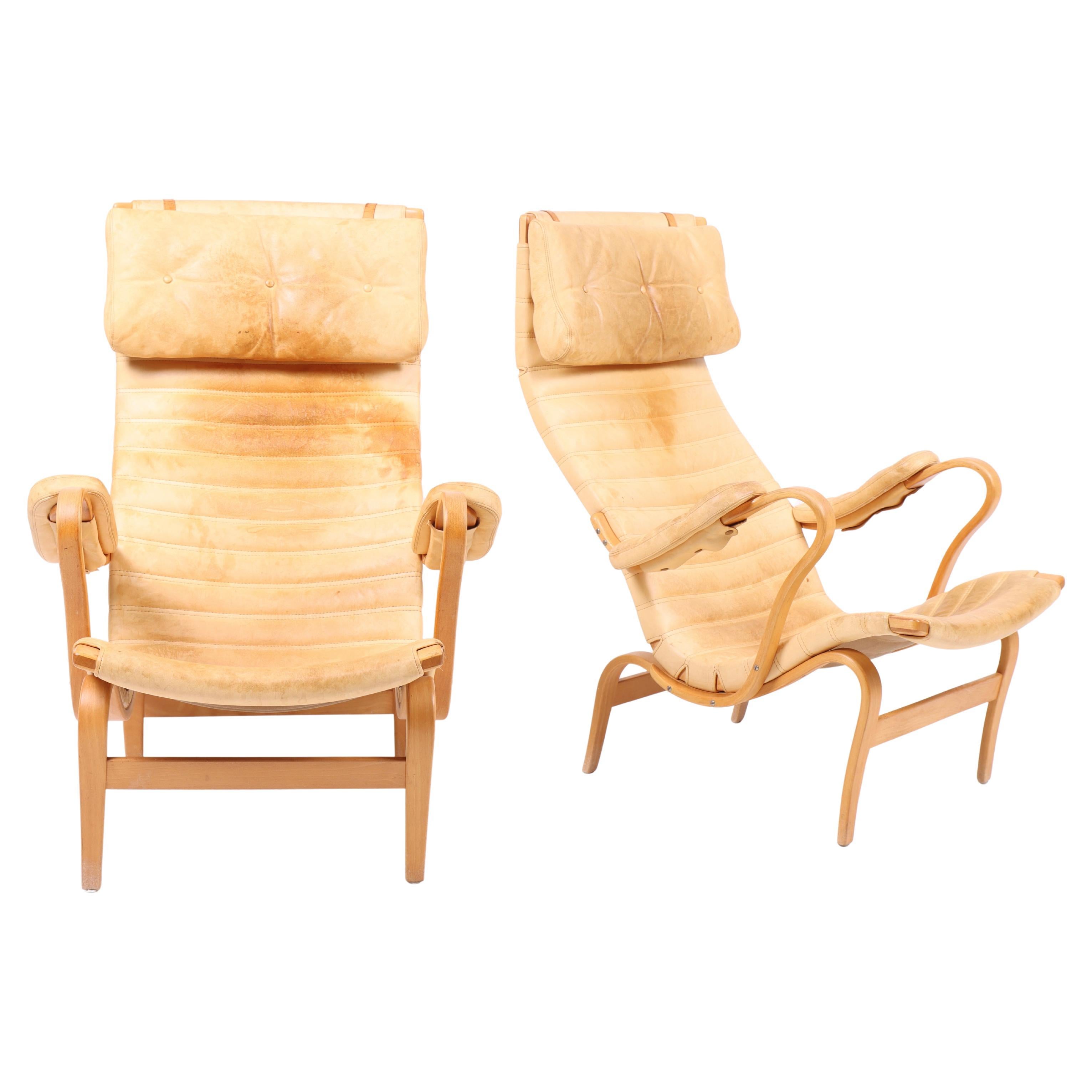 Elegant Pair of Bruno Mathsson Pernilla Lounge Chairs in Leather and Beech