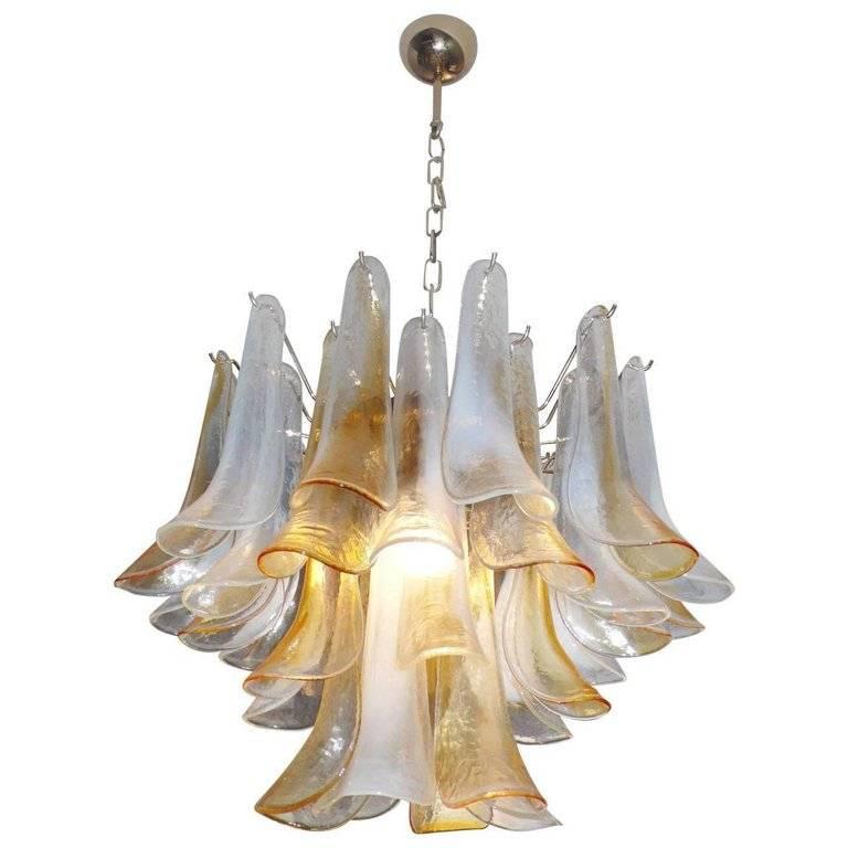 Elegant pair of chandeliers composed of 36 petals in precious Murano glass, 1990s.
   