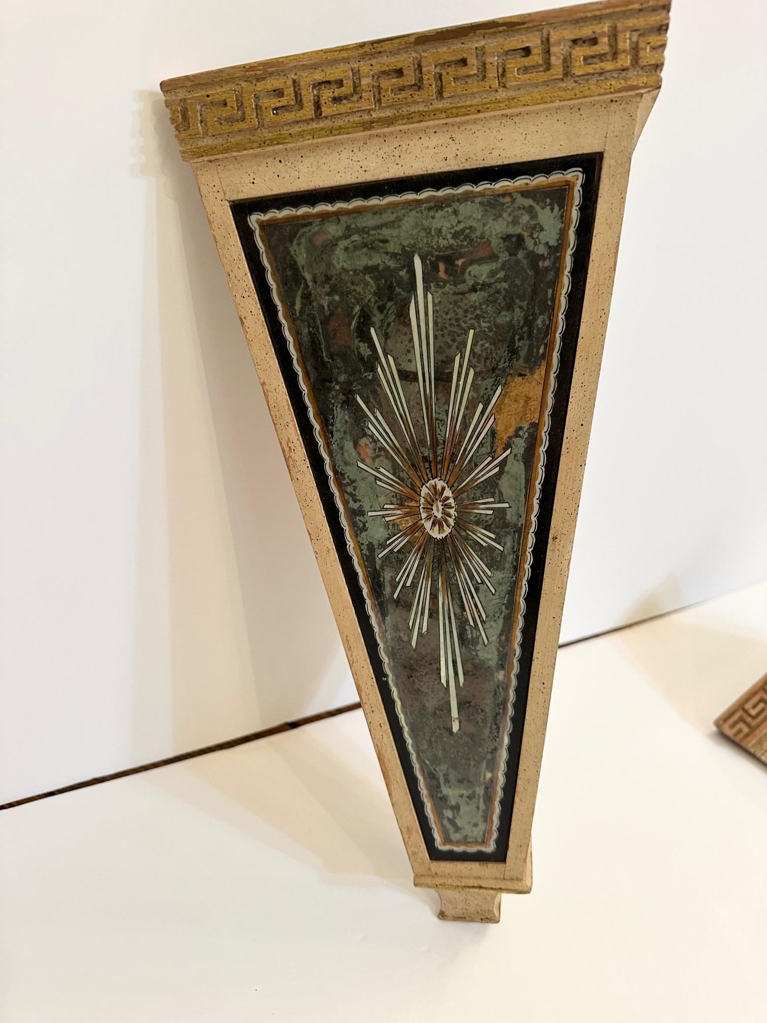 Stunning pair of antique wall pockets with reverse painting on glass decoration and timeless Greek key embellishments.
Zinc inserts
