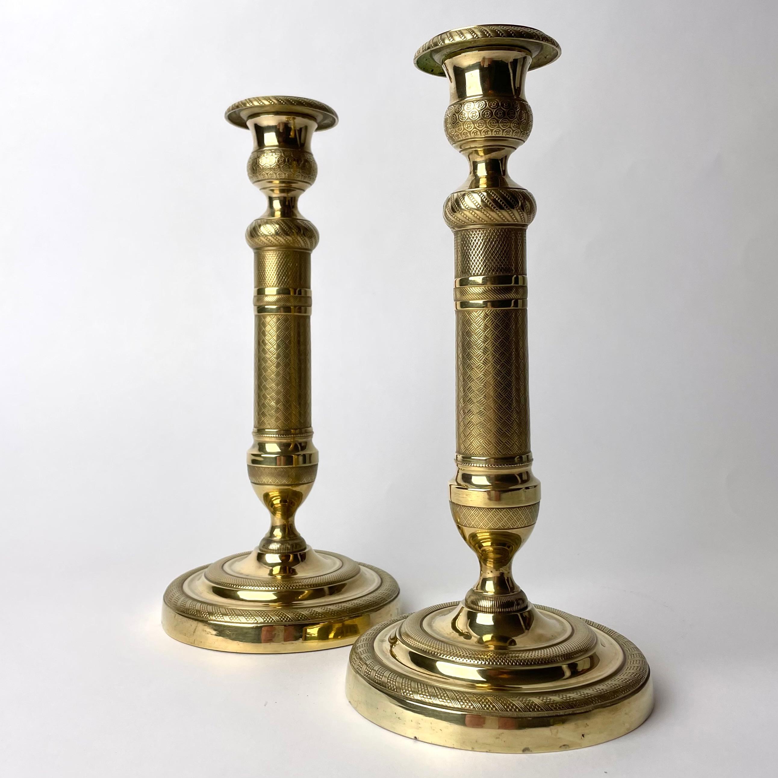 French Elegant pair of Empire Candlesticks in gilt bronze from the 1820s For Sale