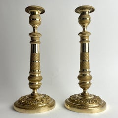 Elegant Pair of Empire Fire-Gilt Bronze Candlesticks, France, 1820s