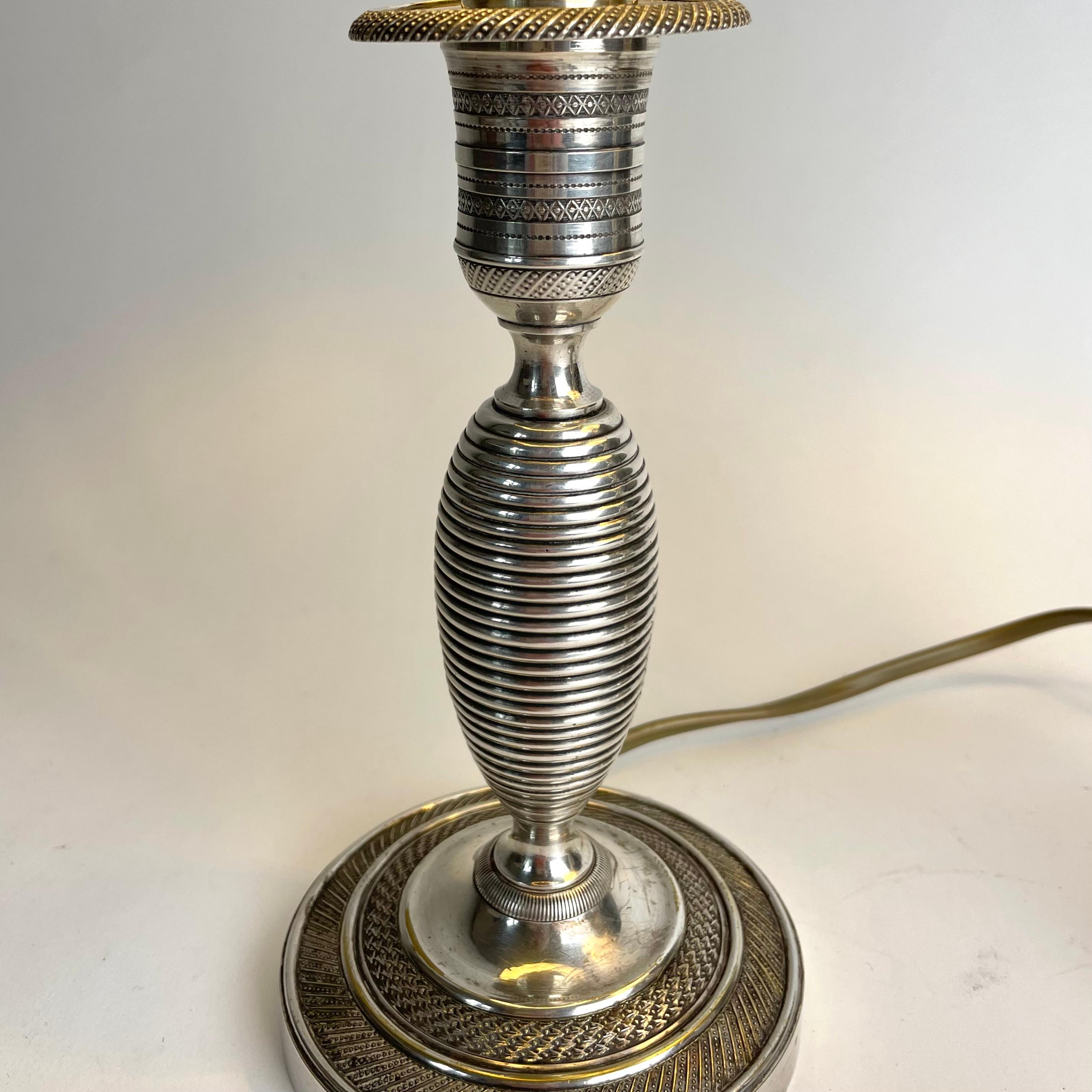 Bronze Elegant pair of Empire Table Lamps, originally candlesticks from the 1820s For Sale